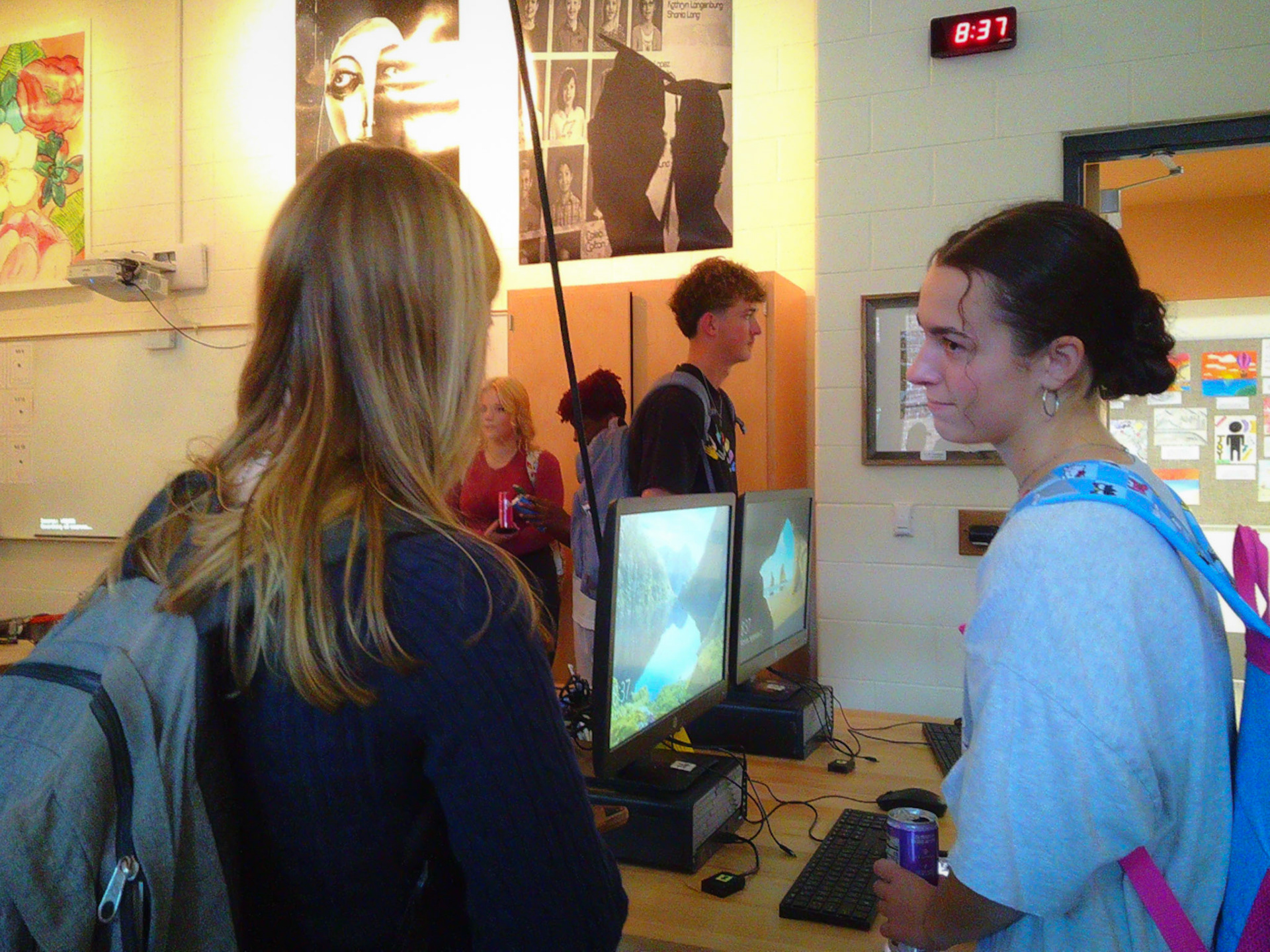 Seniors Abby Skibinski and Avarey Lippert chat about yearbook class before navigating the bustling halls of Caledonia. (Photo by Molly Larson)