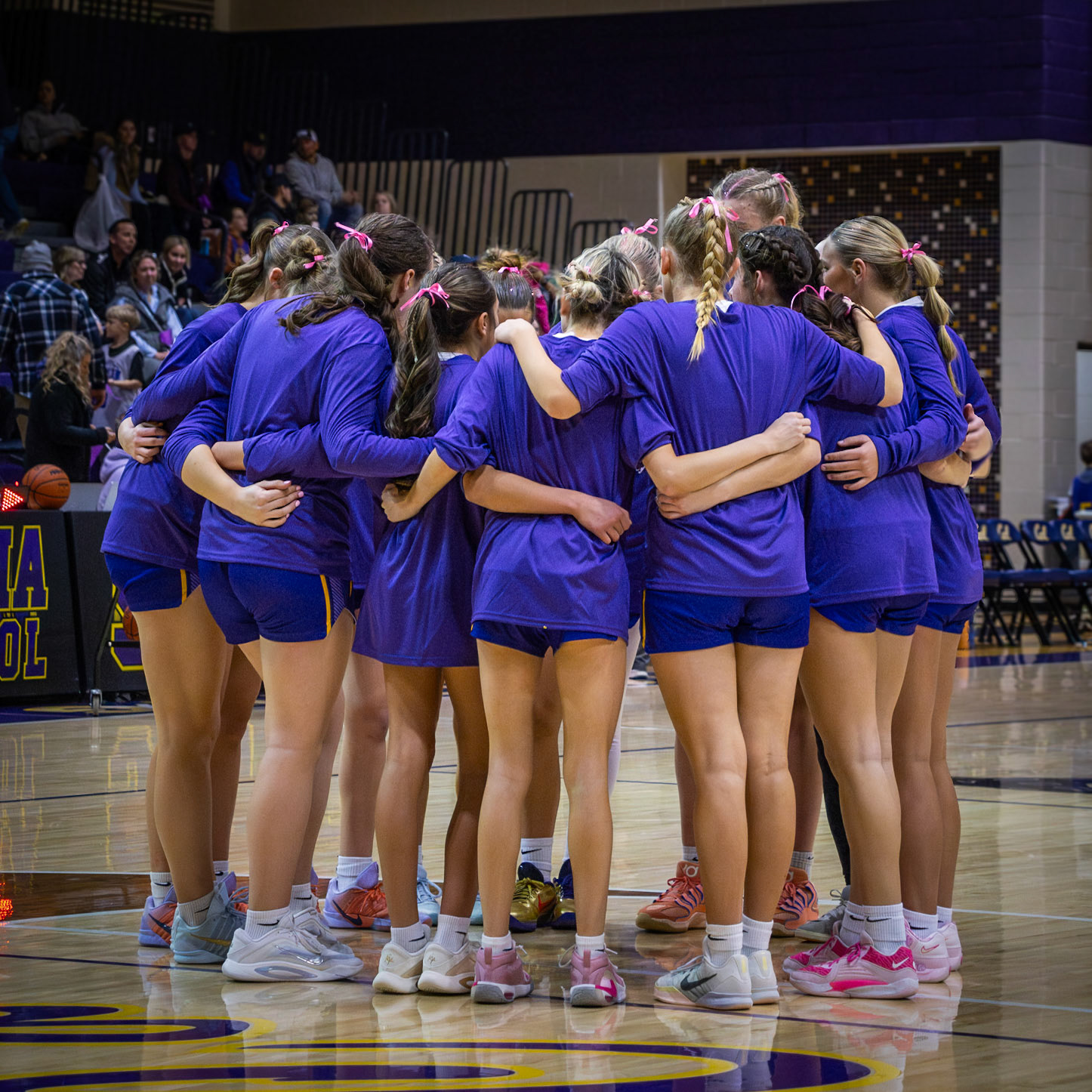 United, arms wrapped tightly around each other for senior night. (Photo by Aibree Akers)