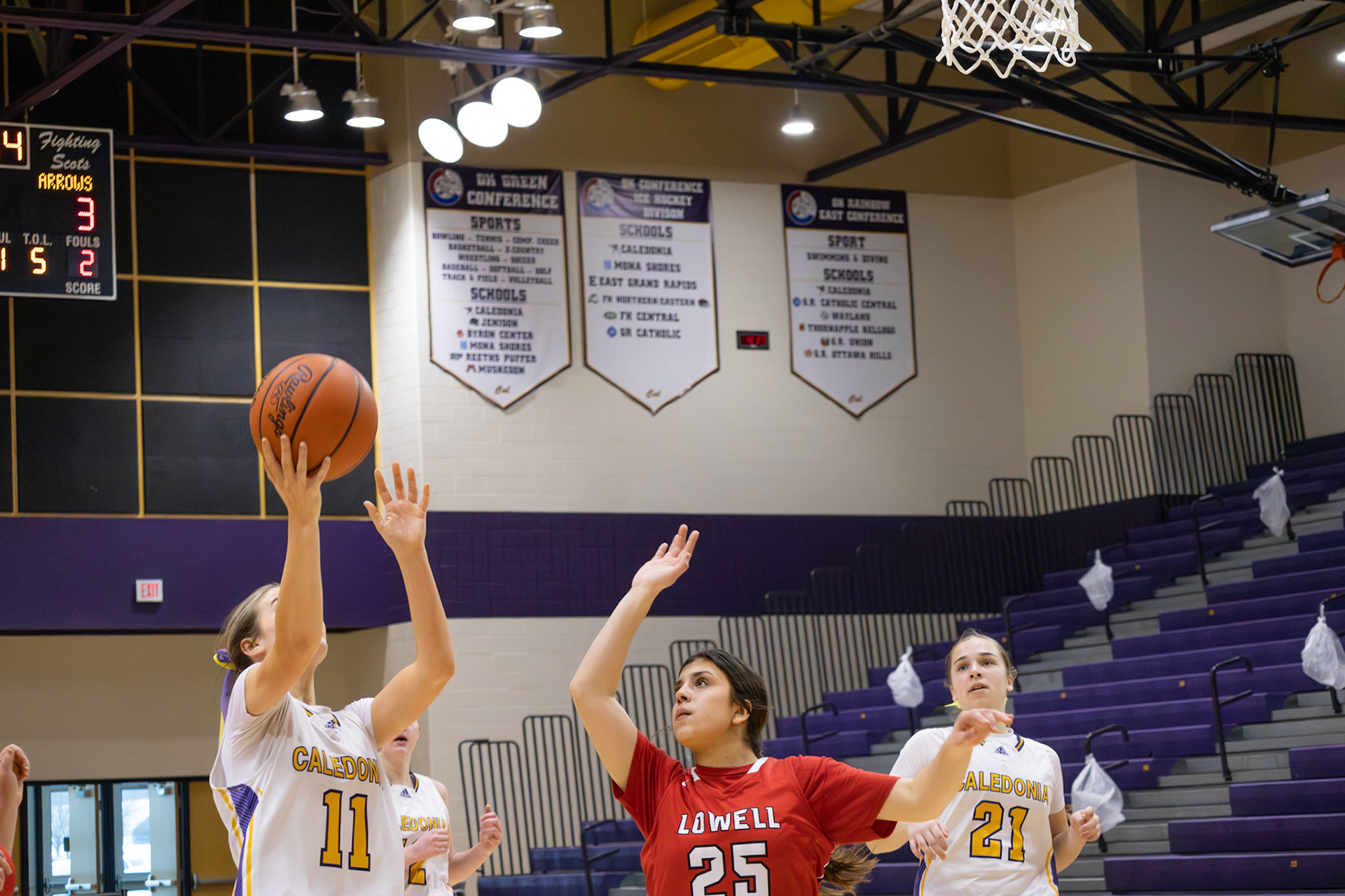 Addi Hacht rises up for a smooth finish, keeping control and focus at the rim. (Photo by Landry Mueller)