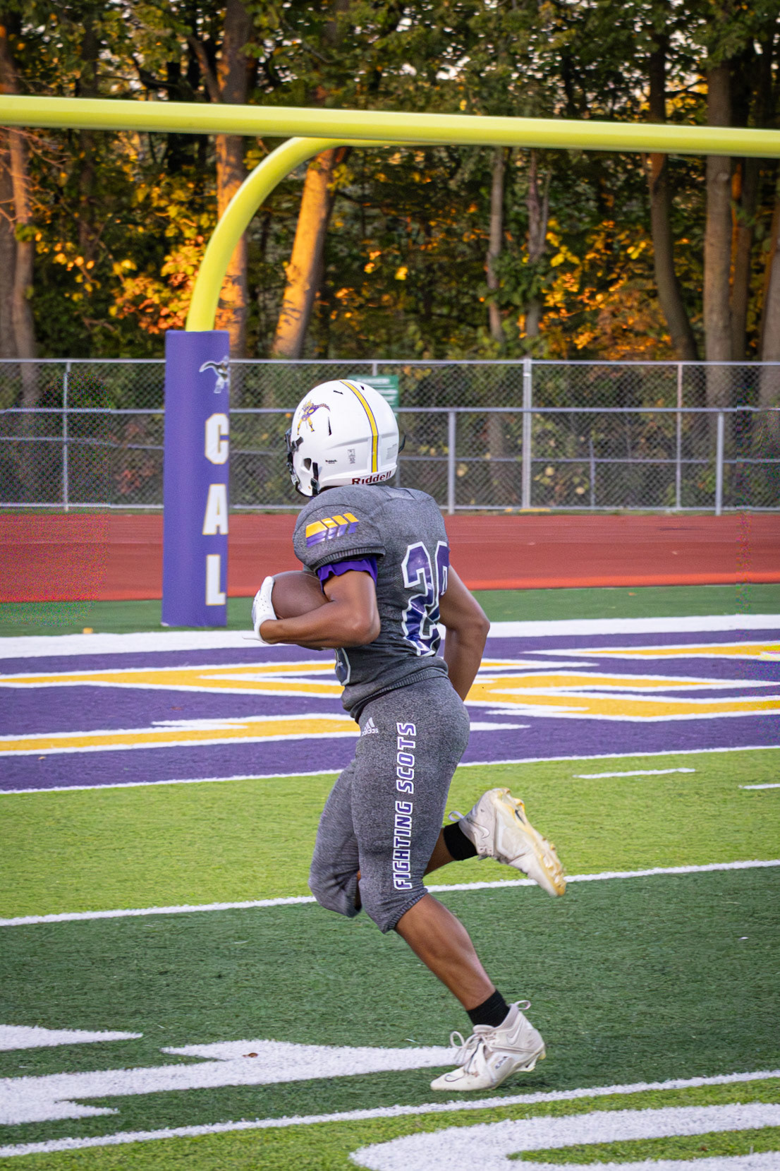 GREAT DAY Robert Day succeeds in avoiding the Falcolns, scoring another touchdown for the Scots. (Photo by Molly Muller)