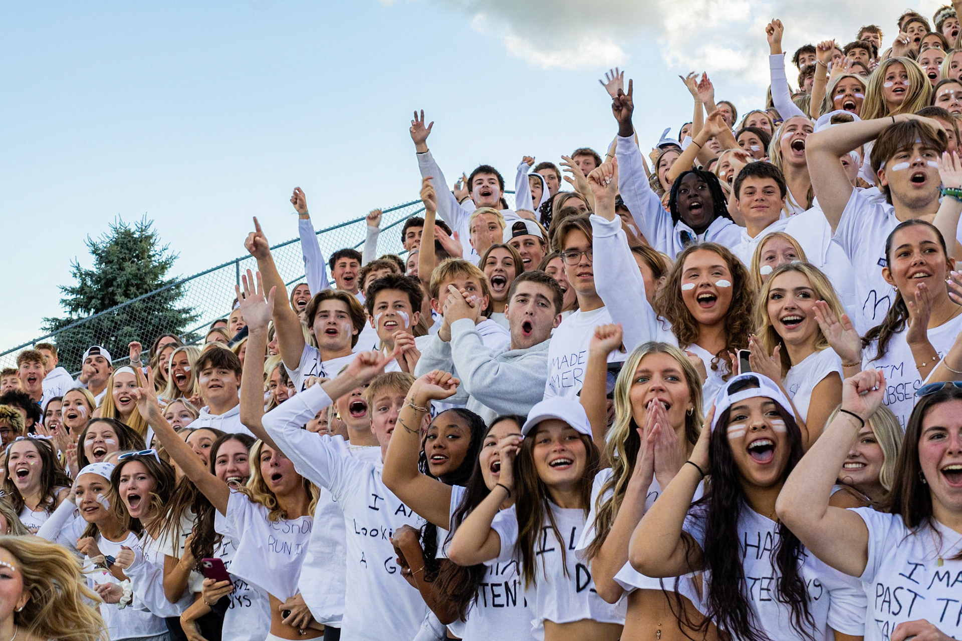 Students cheer as Caledonia scores their first touchdown of the game versus the Reeths-Puffer Rockets. (Photo by Avarey Lippert)