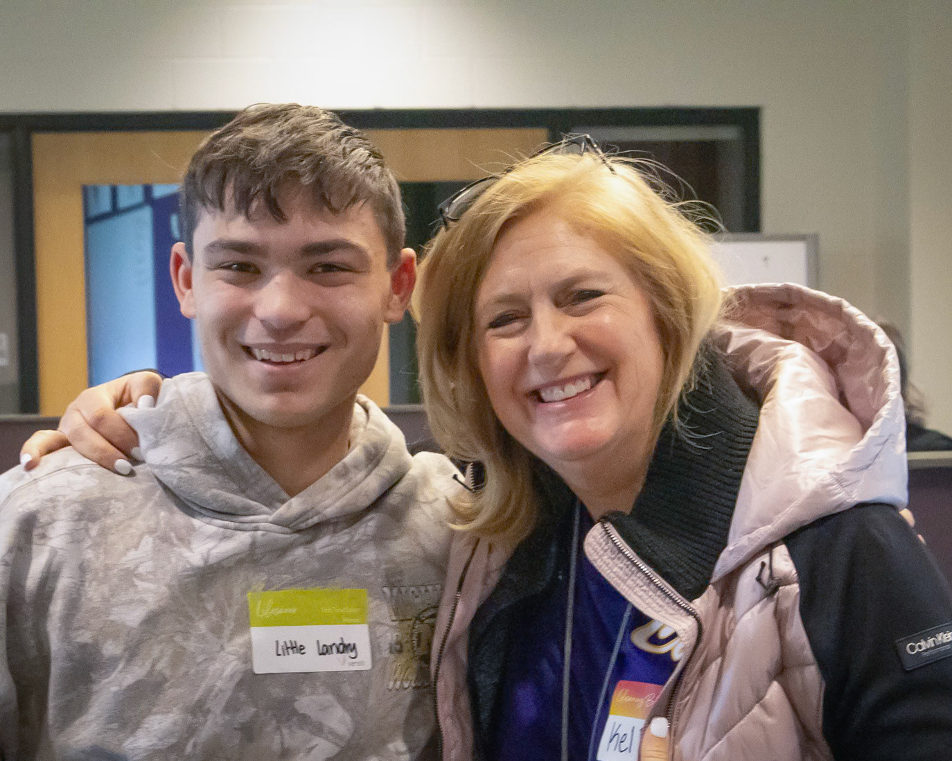 Posing for a picture with Mrs. Green, Landry Mueller thanks her for donating before she heads out the door. (Photo by Ella-Grace Wickens)