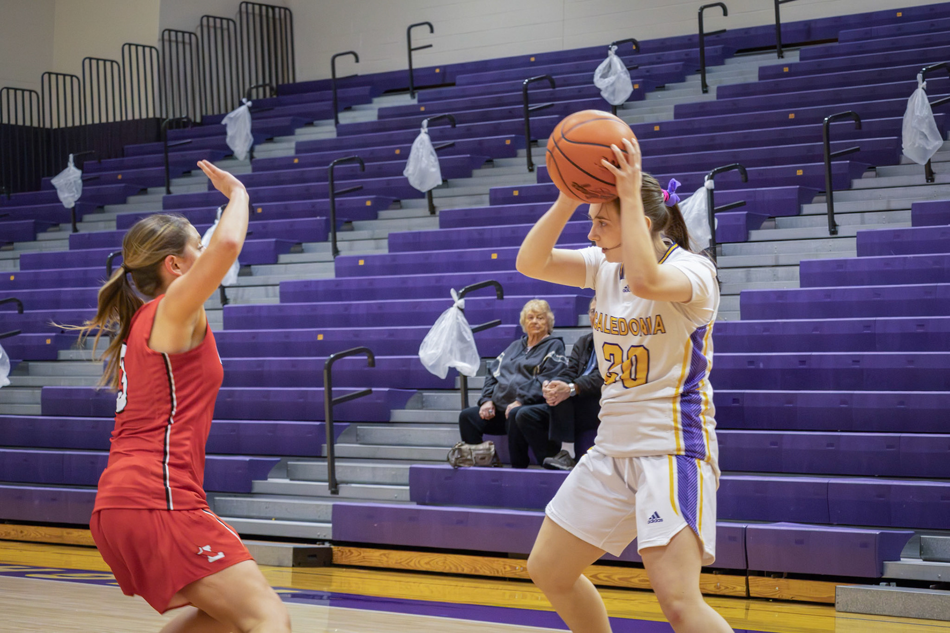 Scanning the court for an open teammate, Kaity Soper waits for the right moment to pass the ball. (Photo by Ella-Grace Wickens)