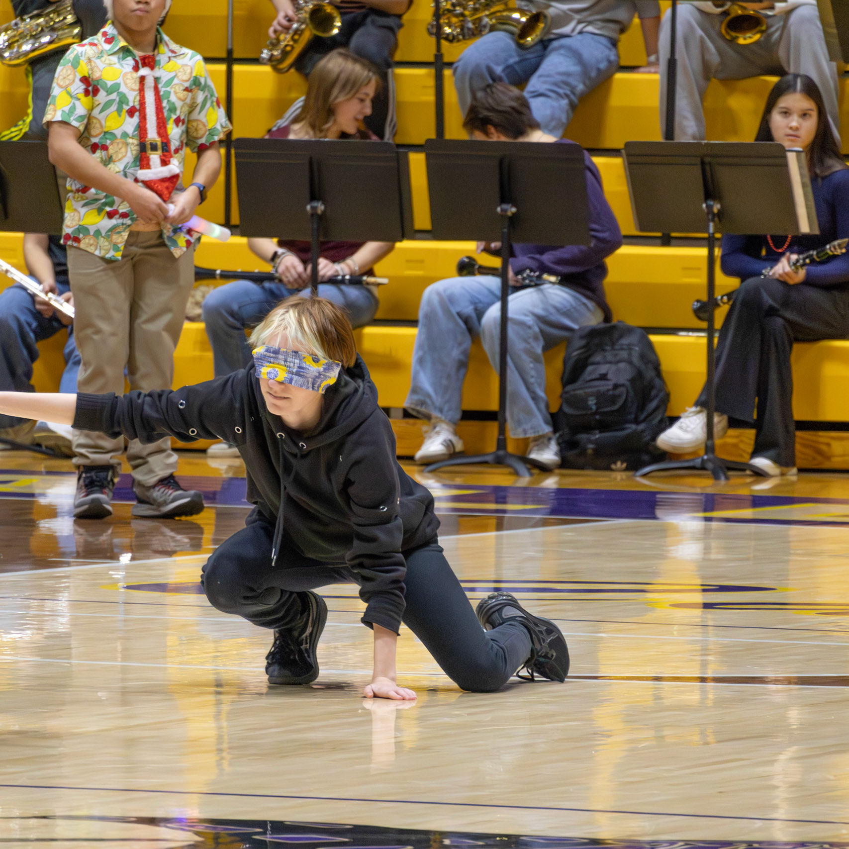In an intense game of blindfold tag, Berkley Nelson uses the "just get down low" strategy. (Photo by Ella-Grace Wickens)