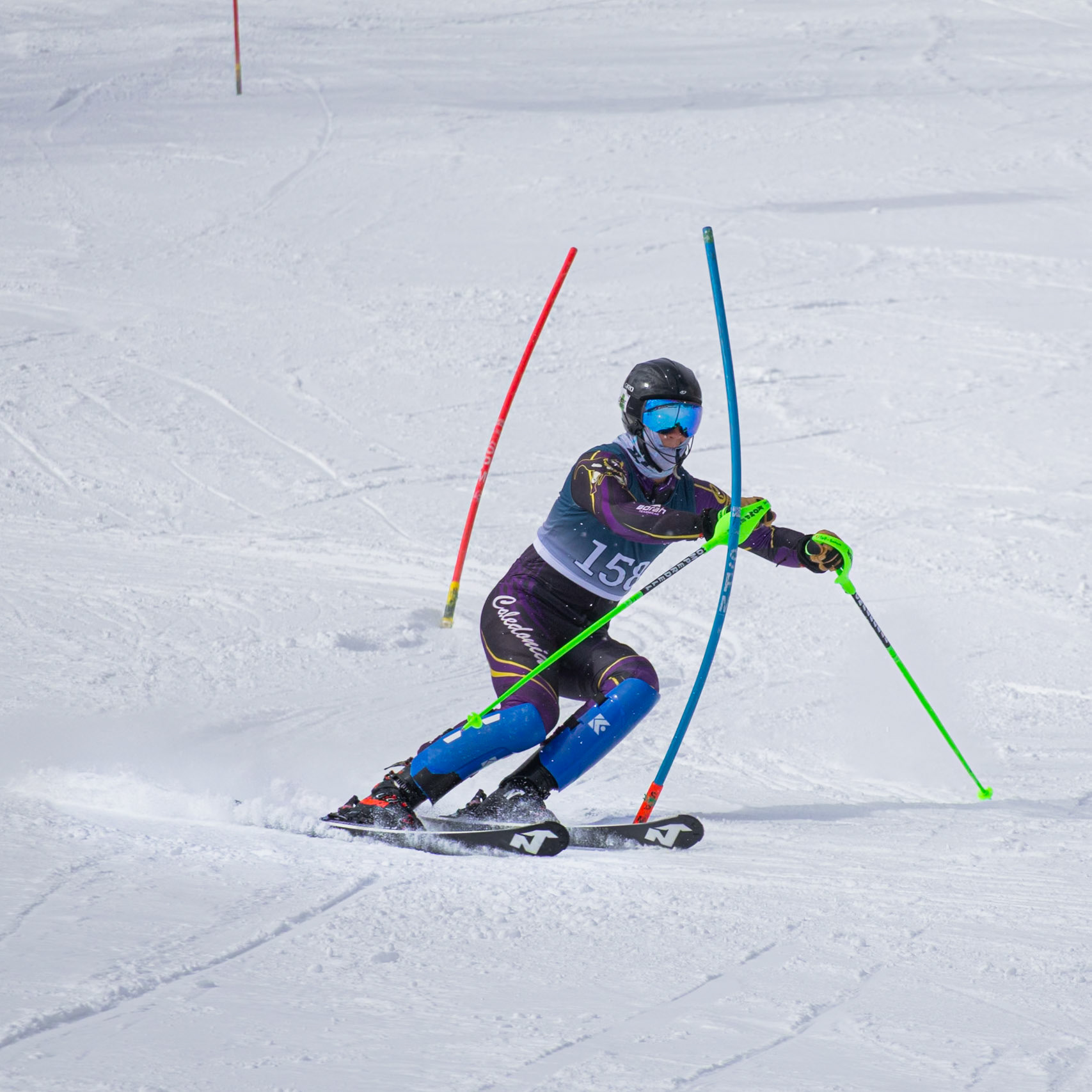 Peter Calhoun carves his skis and powers his way to a fast finish. (Photo by Justin Harper)