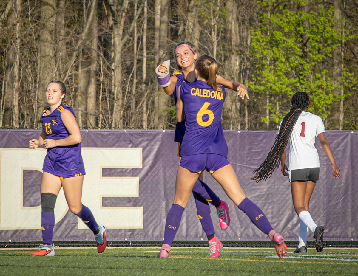 Maya Terryn throws her arms around Kelsey Roszkowski, celebrating the goal. (Photo by Aibree Akers)