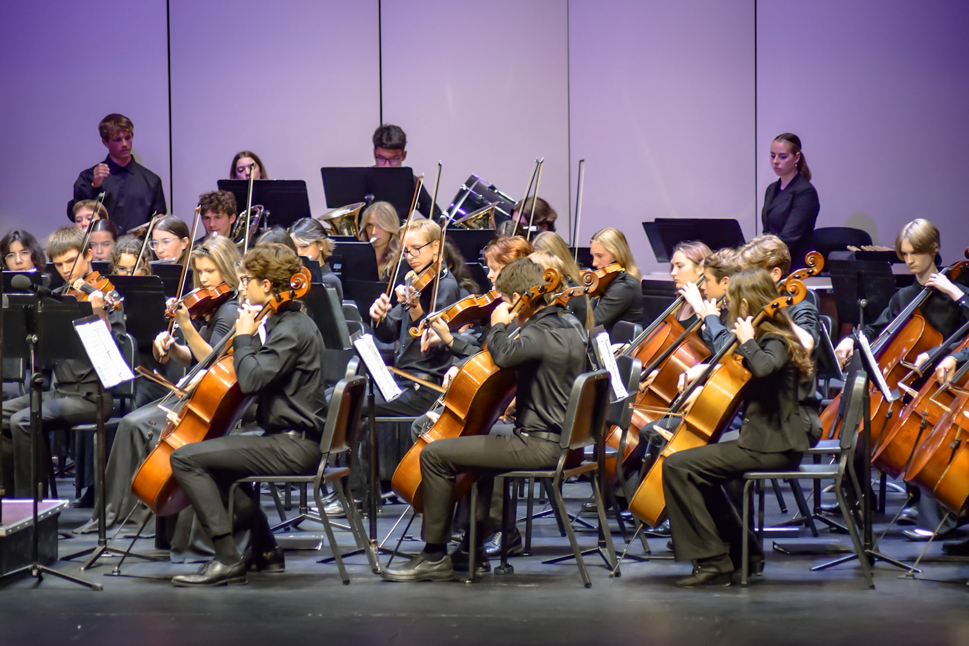 HARMONY The orchestra takes center stage, delivering a performance that captivates every listener, with support from the band. (Photo by Ollie Fox)