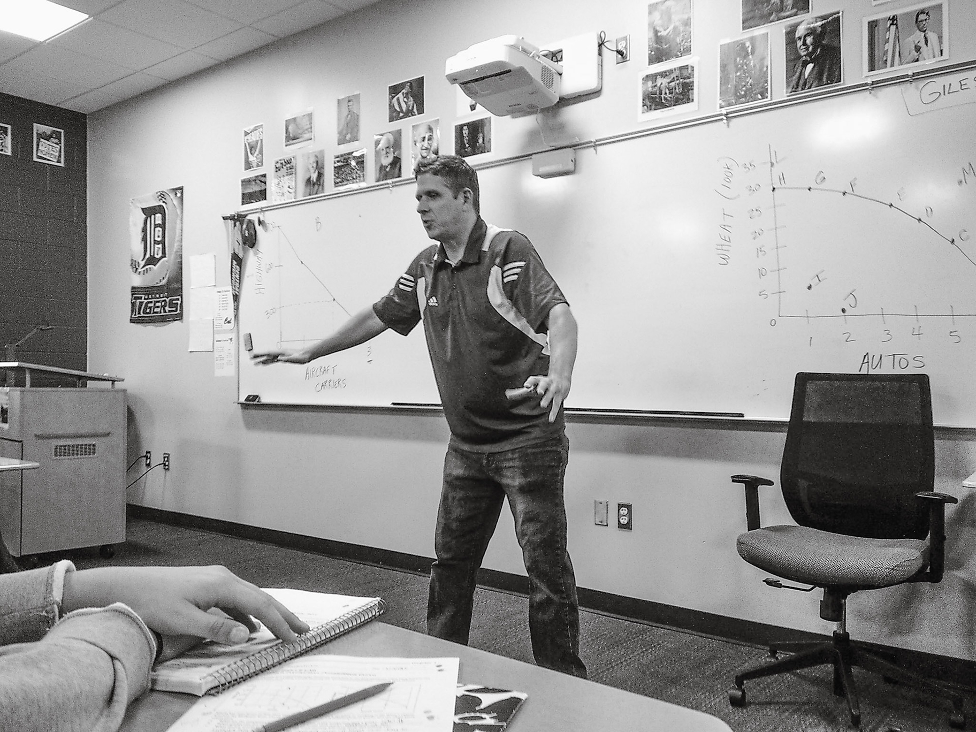 Using his gift for humor and storytelling, Mr. Giles helps students better understand economics concepts. (Photo by Jeremiah Pitman)