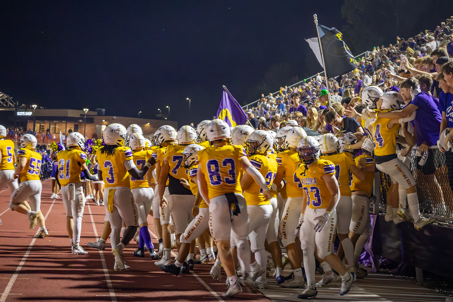 Following halftime, the Fighting Scots hype up the crowd before returning to play against the Buccaneers. (Photo by Milana Rico)