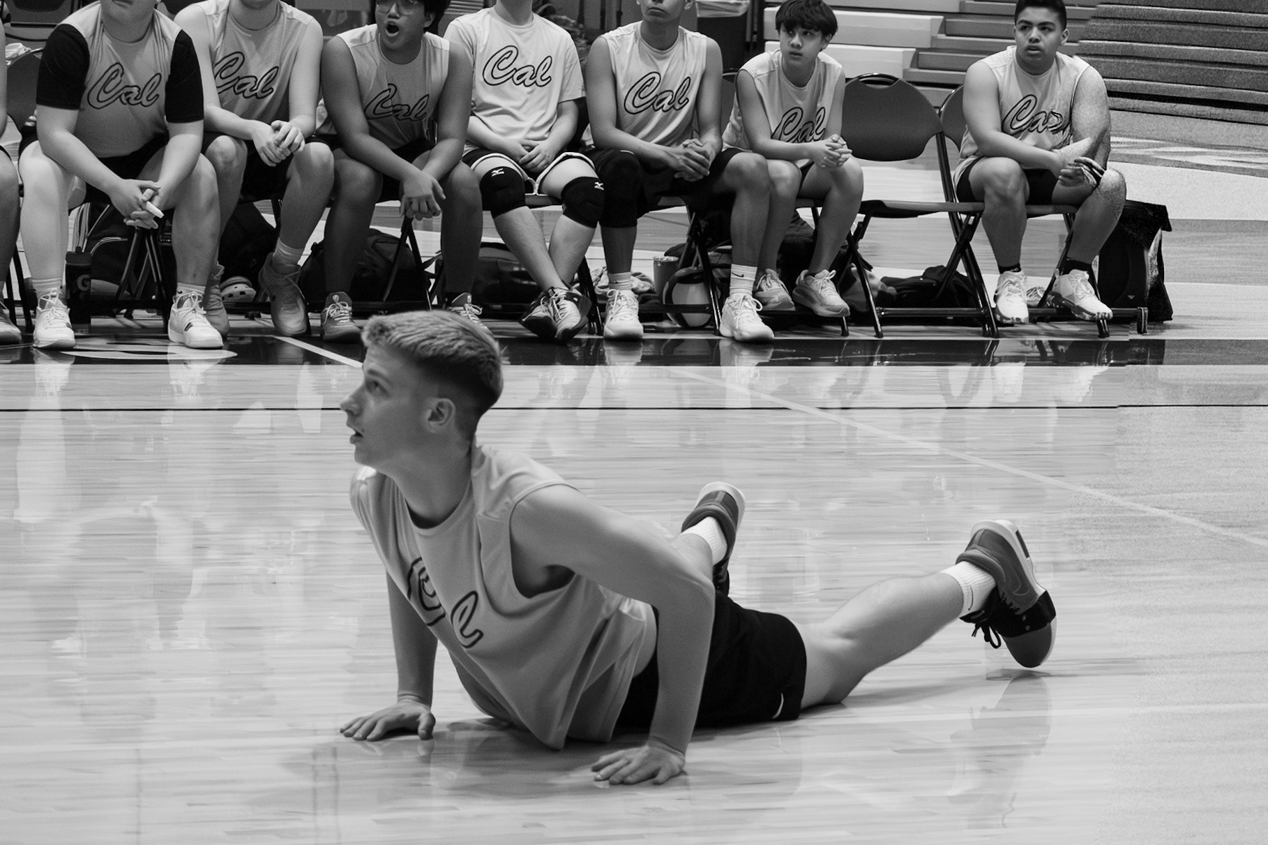 Transfer player Brayden VanWyk from Wayland looks up to see if the volleyball clears the net. (Photo by Adi Malvankar)