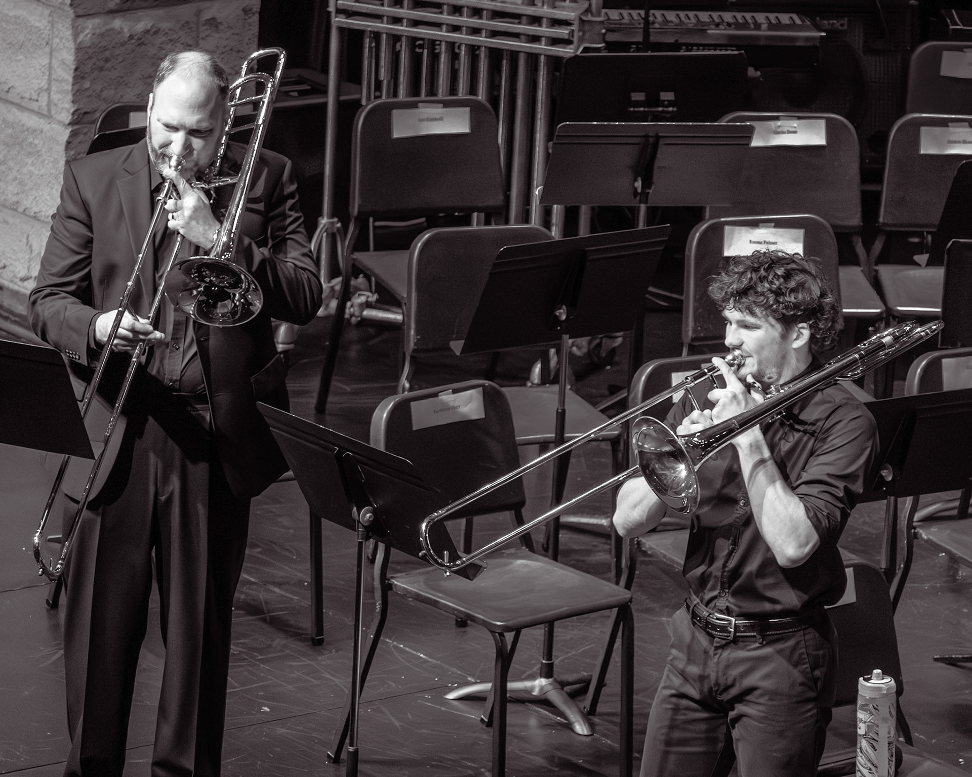 Ben Moss plays a bass trombone trilogy with band director Mr. Wellfare. (Photo by Eva Sierra)