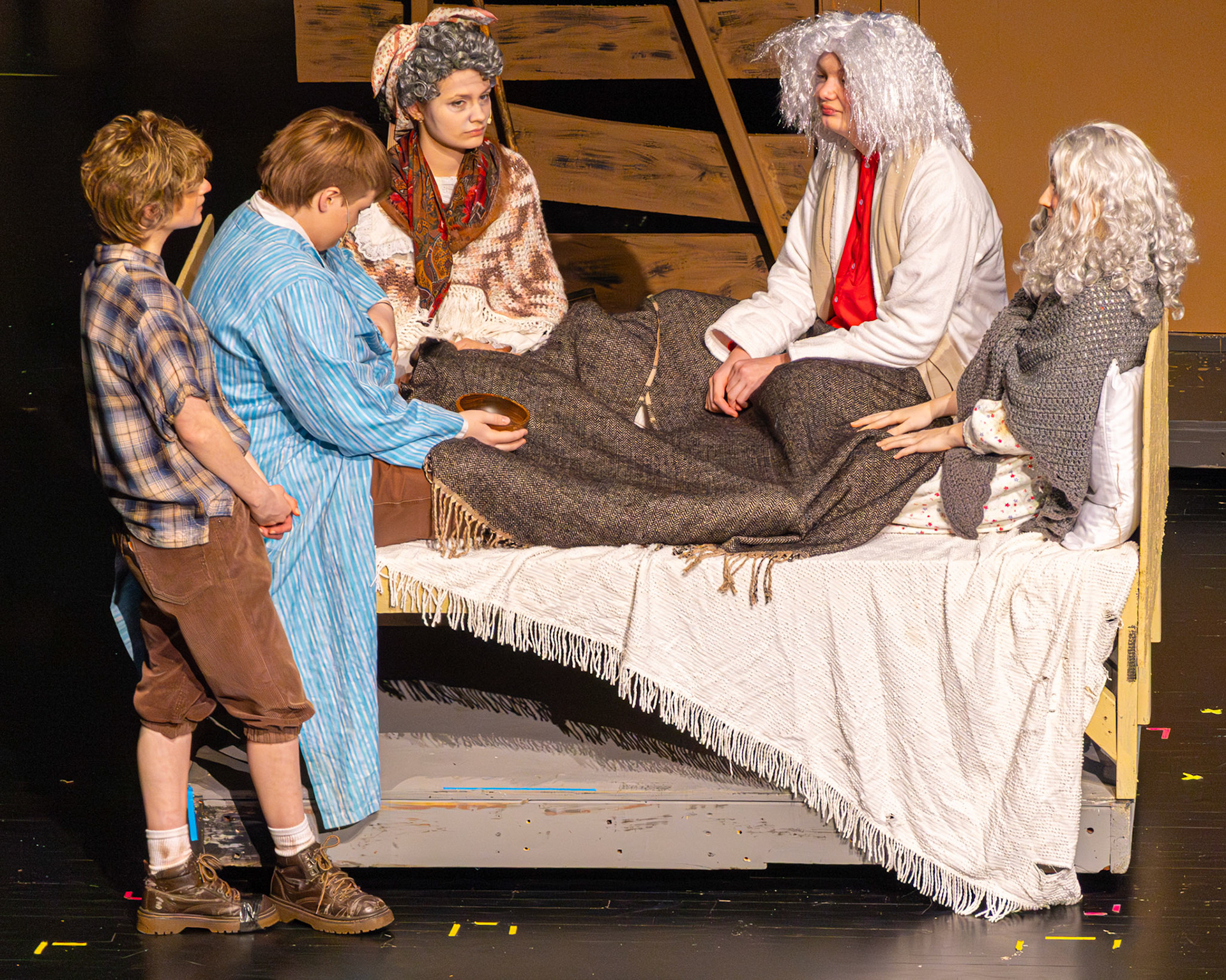Four grandparents, one tiny bed, and a whole lot of love. (Photo by Mackenzie Popma)