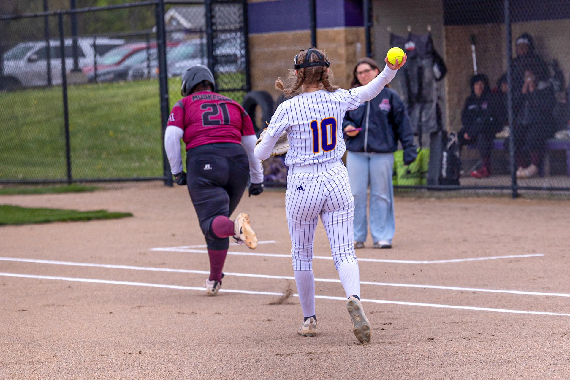 Addyson Olin makes the throw to first base after fielding the play for the Scots. (Photo by Landry Mueller)