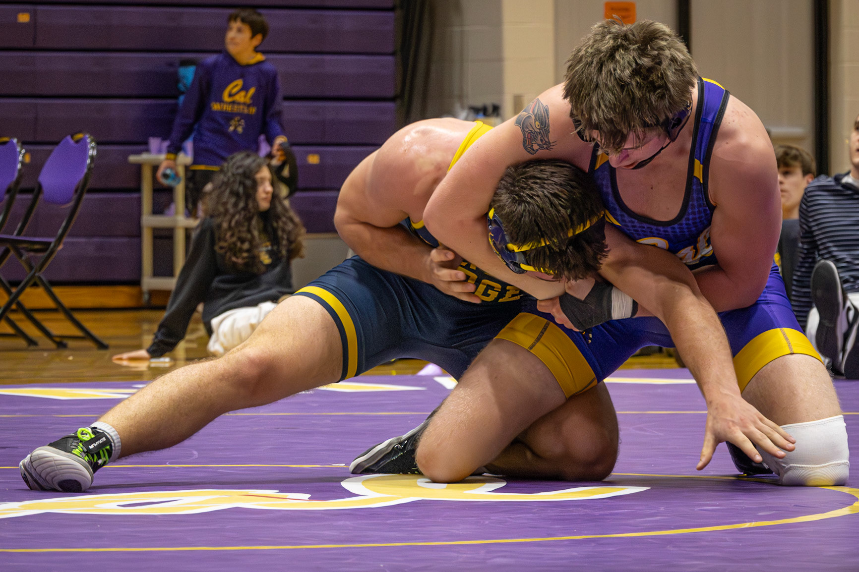 Caden Nostrant holds his opponent in a pin and secures another victory for the Caledonia wrestling team. (Photo by Rhyan Guzman)