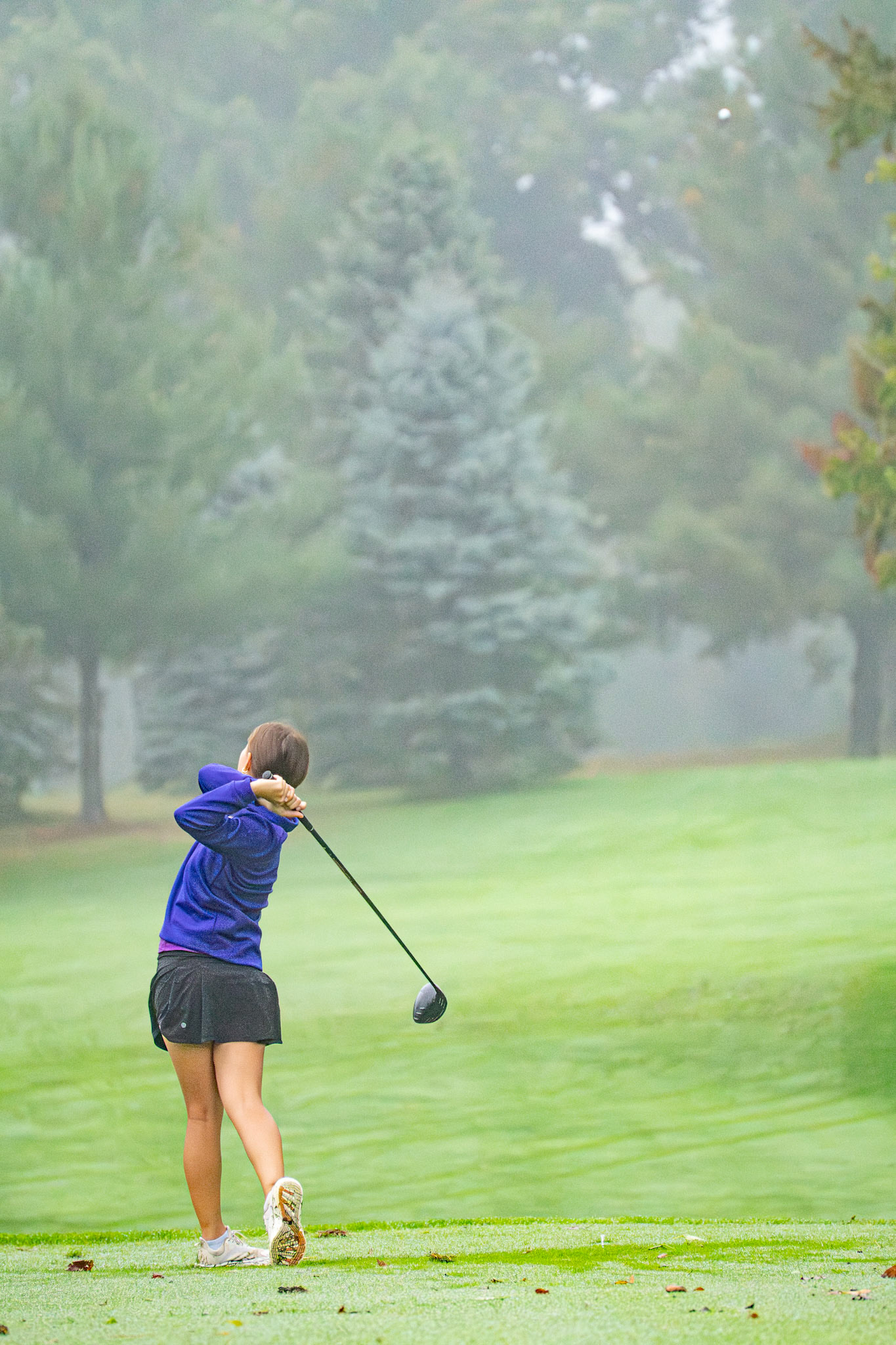 Katie Honhart watches her shot soar down the fairway.(Photo by Jolie King)