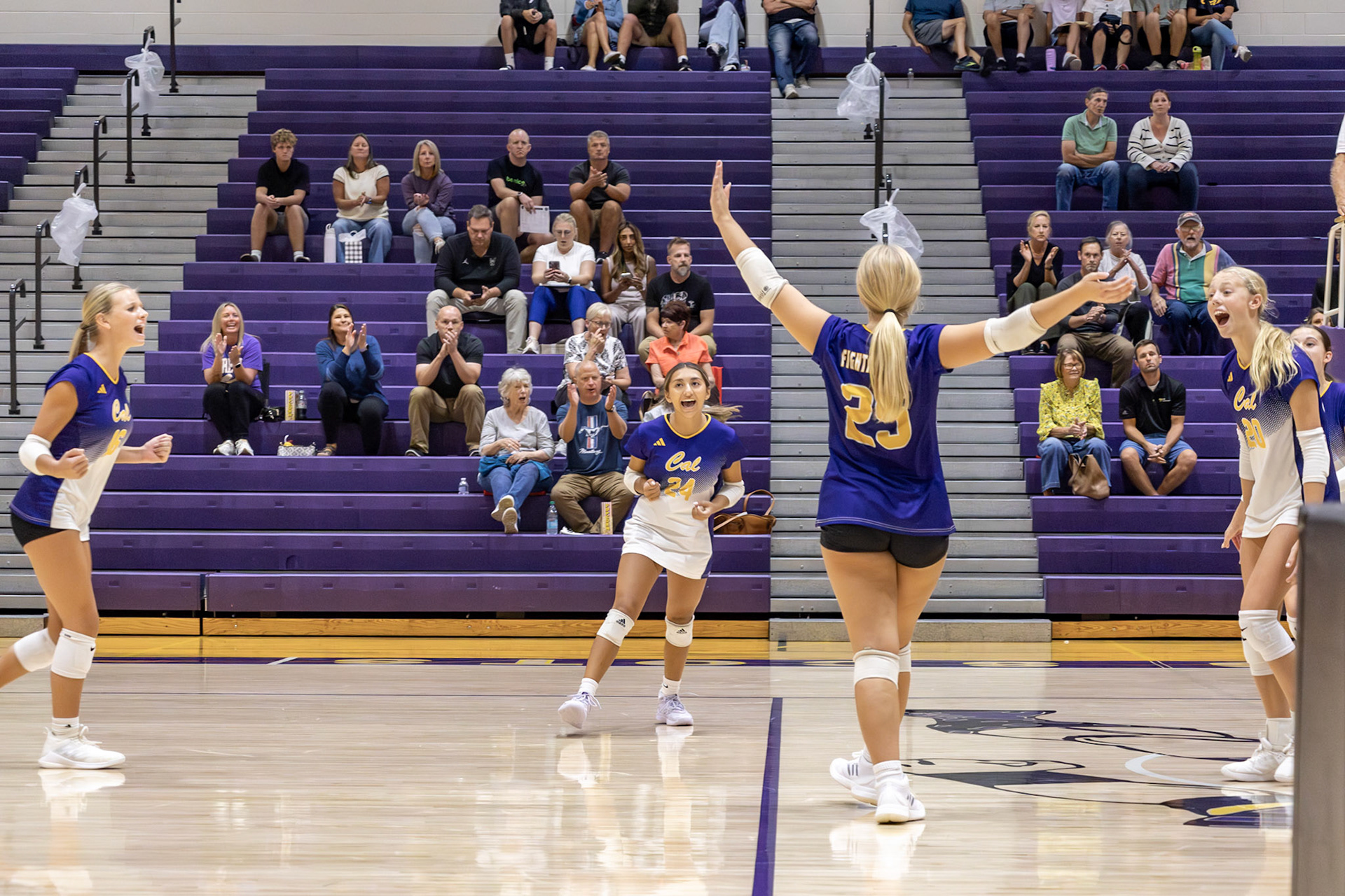 After a tie breaking point against the Reeths-Puffer Rockets, the momentum of the court shifts and the Scots take control. (Photo by Khloe Lowande)