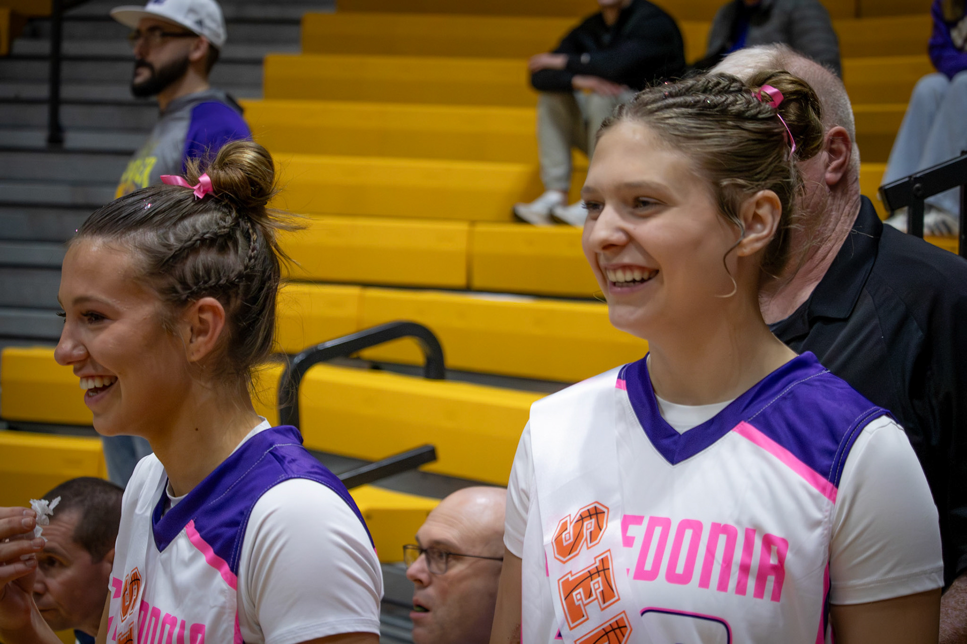 Jolie King and Baylee DeVries share happy tears as they prepare for senior night. (Photo by Maggie Loomis)