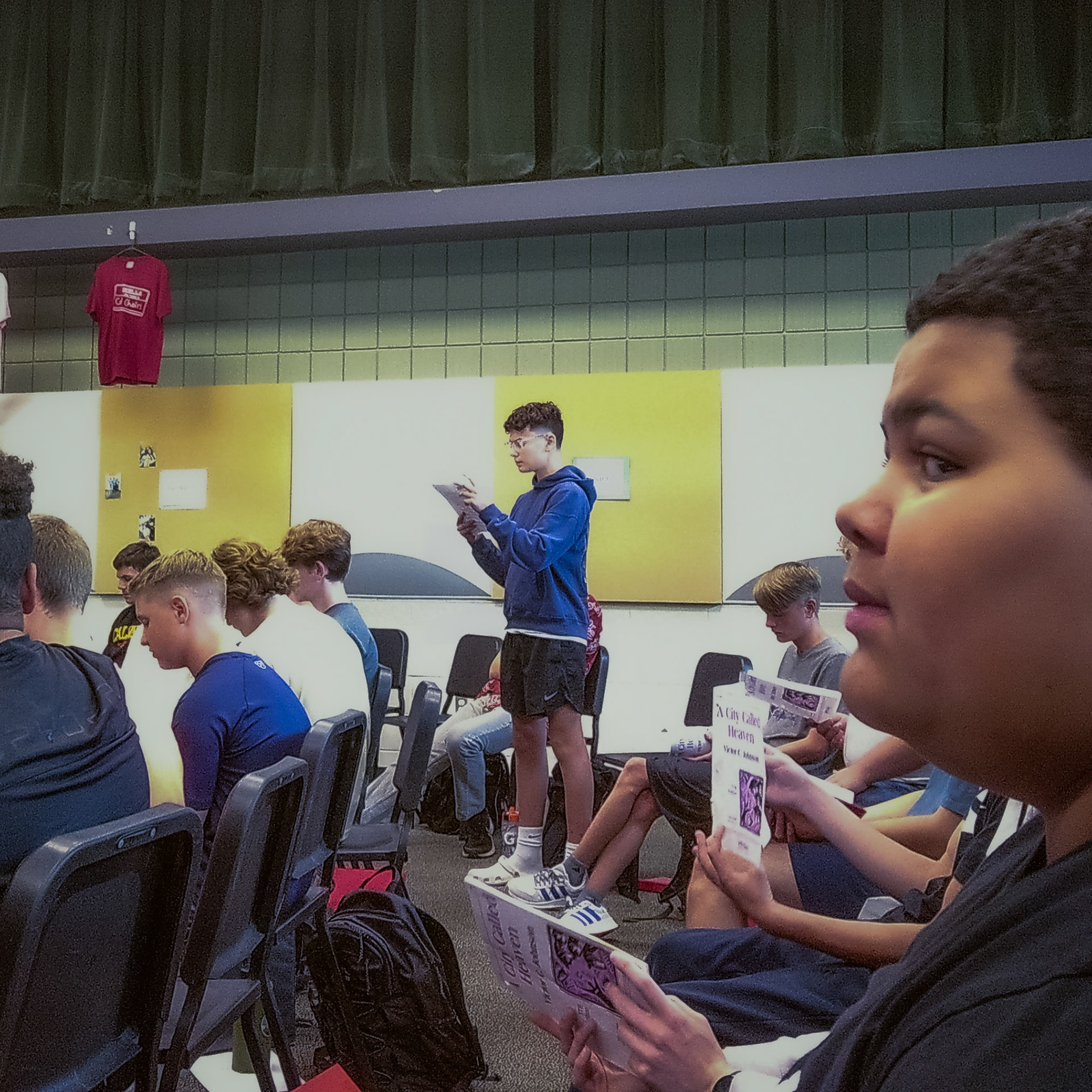 Lucas Temple takes a shot at a solo in choir. With all the pressure on him, he keeps singing through. (Photo by Jaren King)