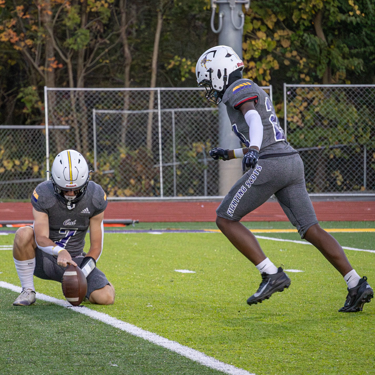 Stepping up to the ball Zangi Mungili gets ready to kick the ball through the goal posts to score an extra point. (Photo by Ella Wickens)