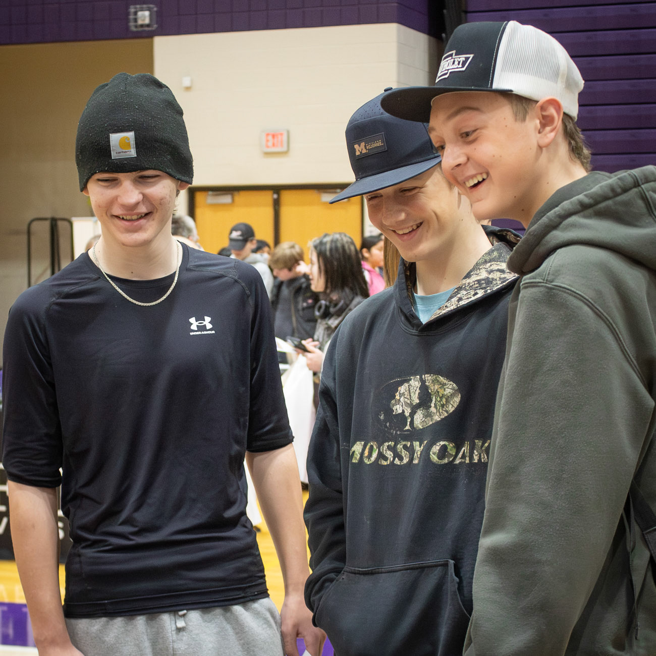 Colyn Grasman, Lukus Buiter, and Rowan Wrubel celebrate their prize win. (Photo by Mya VanderZwaag)