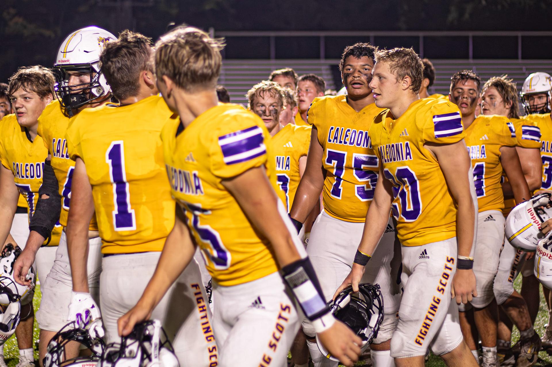 Andrew Hanna and his team celebrating a clutch win against Grand Haven. (Photo by Lauren Parker)