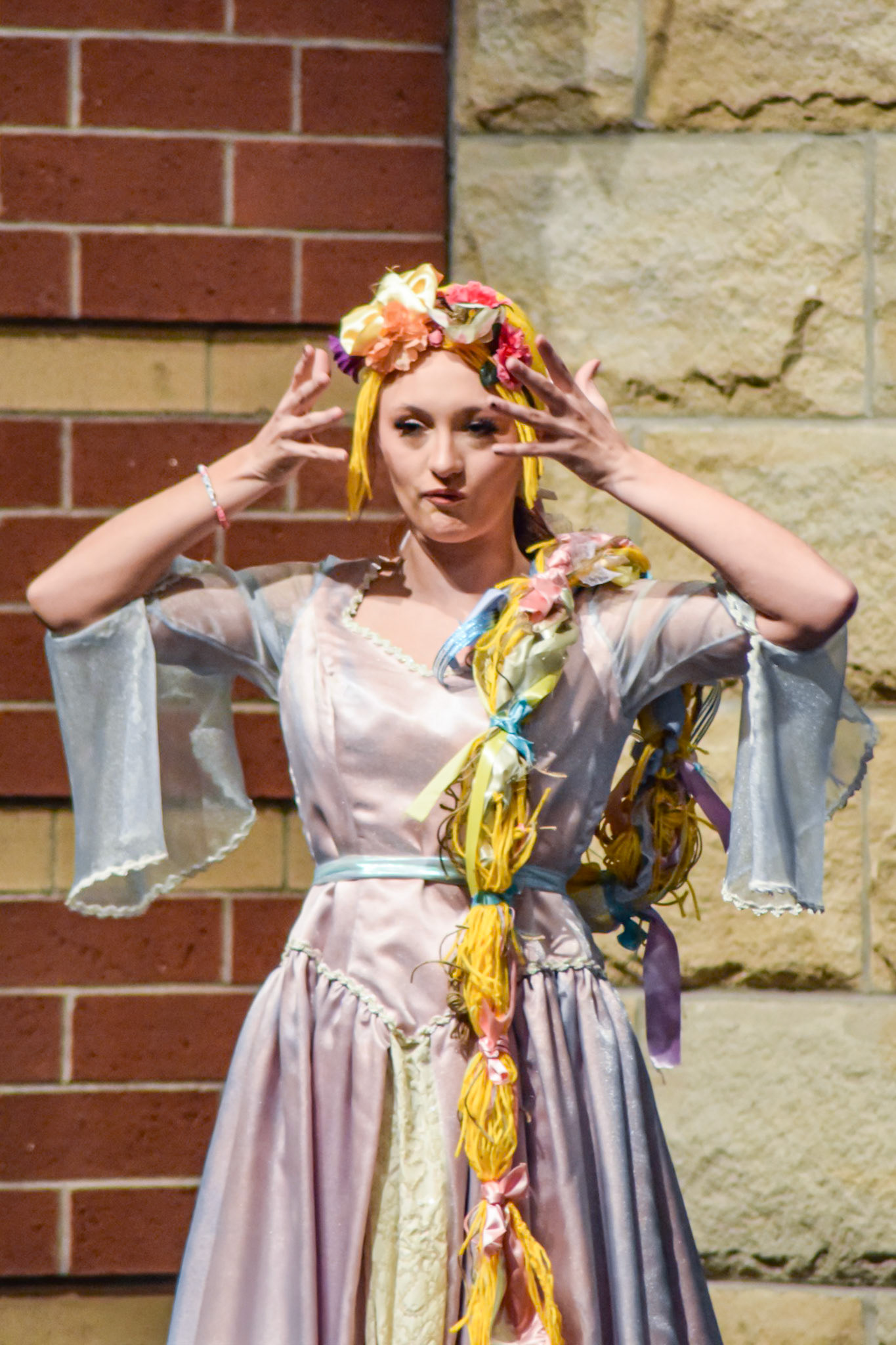 FAIRY TALE MOMENT Maggie Koopman, dressed as Rapunzel, gets ready for her turn in the costume parade. (Photo by Ollie Fox)