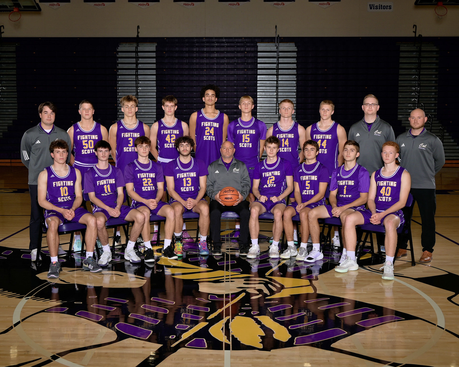 Varsity Boys Basketball (Photograph displayed with permission from Geskus Photography Inc.)