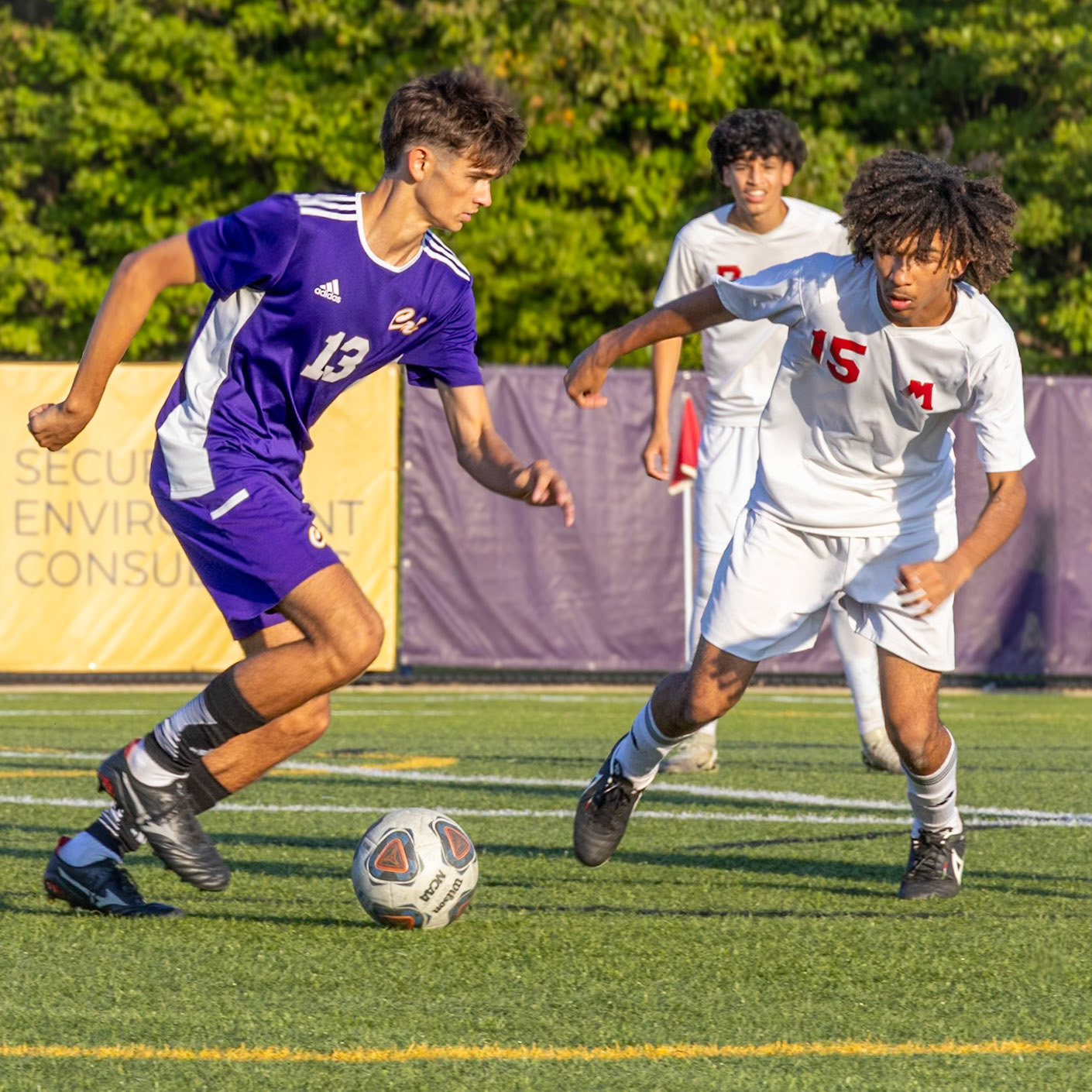 Rocco Calabrese pushes forward to maintain the ball, holding possession tight. (Photo by Vivian Hoffman)