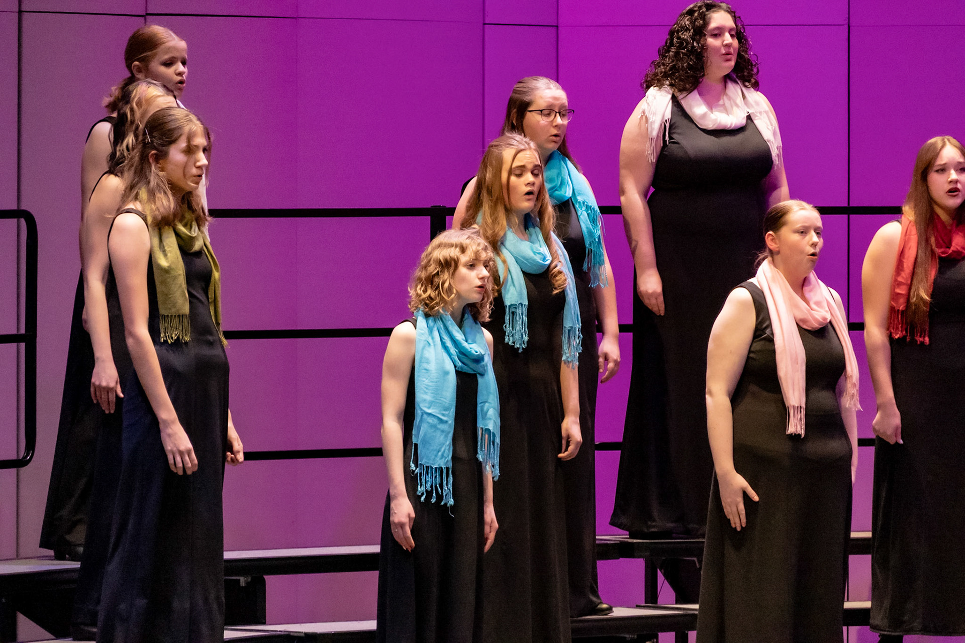 Emma Kellog concentrates on the beat during the 2026 Winter Treble-Choir Concert.  (Photo by Lucas Swartz)