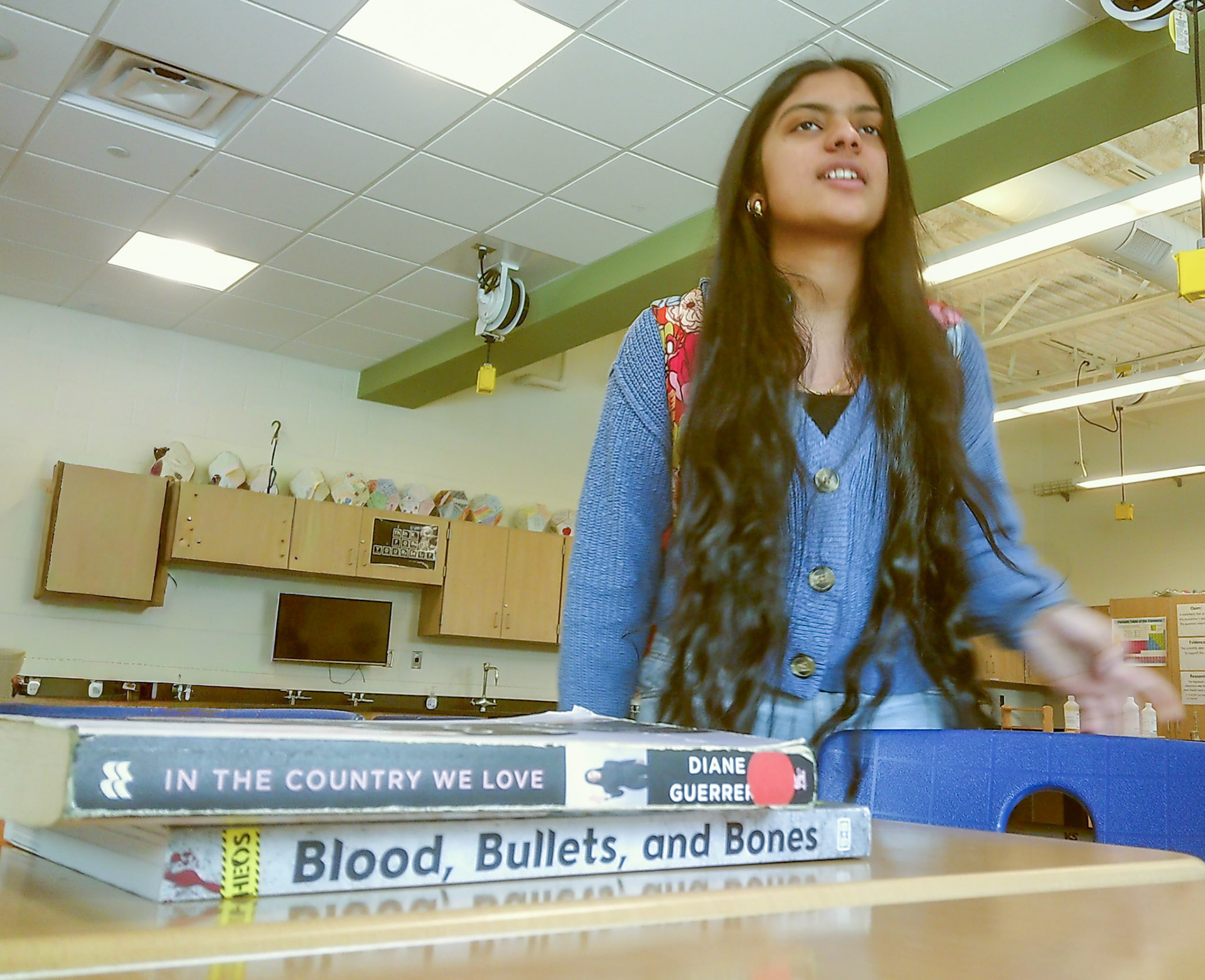 CHIT CHAT While packing up for lunch, Shrimathi Kumar talks to her friend. (Photo by Sophie Grajewski)