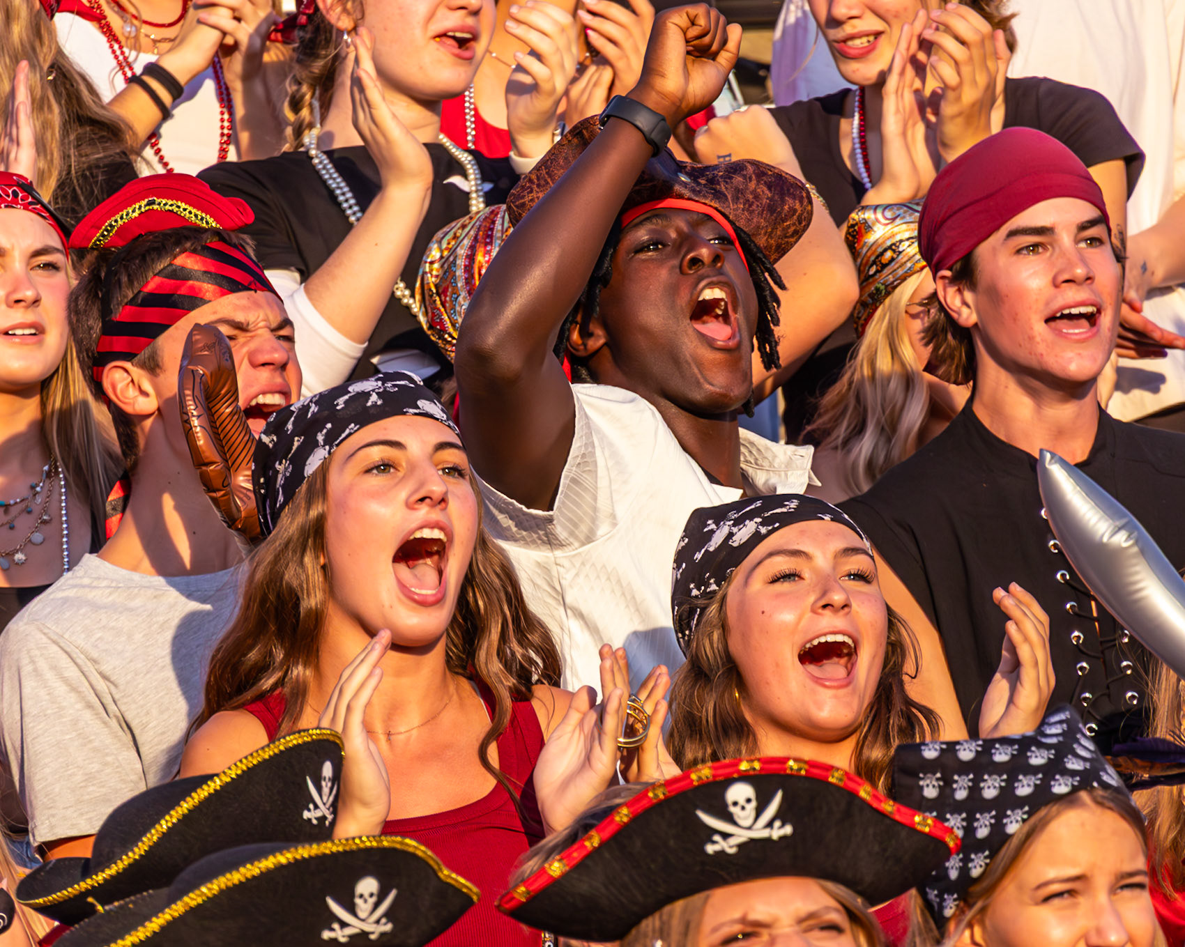 After a big Cal score against Hudsonville, the pirate-packed student section erupts. (Photo by Lillian Jackson)