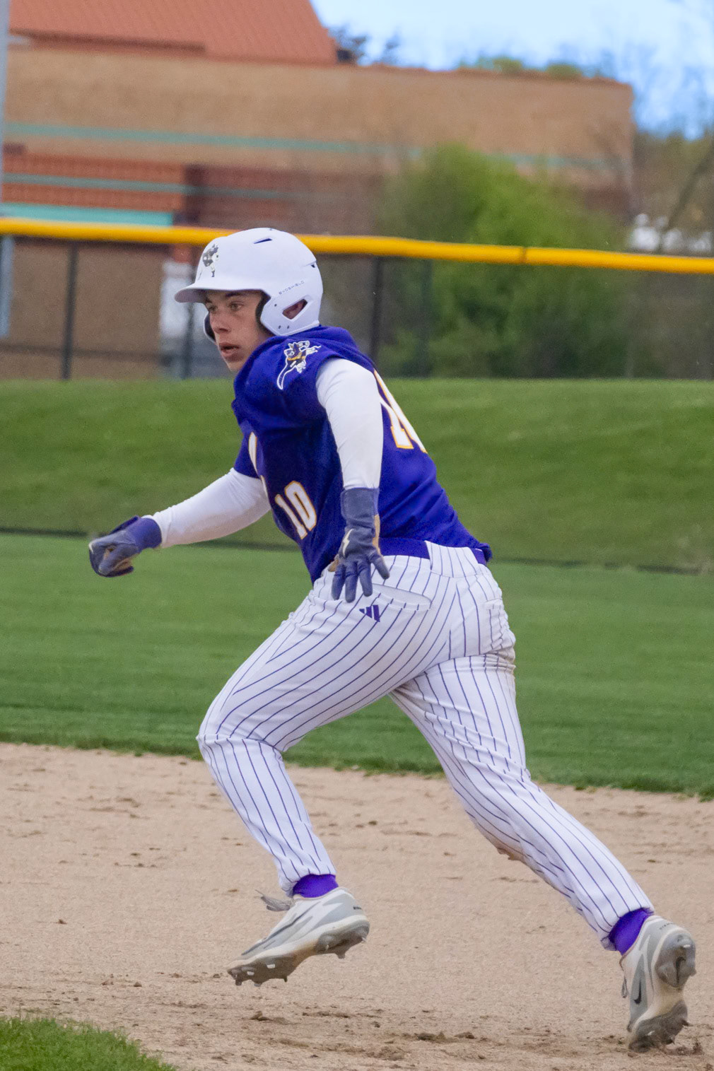 Making his way to second ,Jackson McNew makes a run for it when he realizes a wild pitch was thrown and the oppurtunity arose. (Photo by Ella-Grace Wickens)