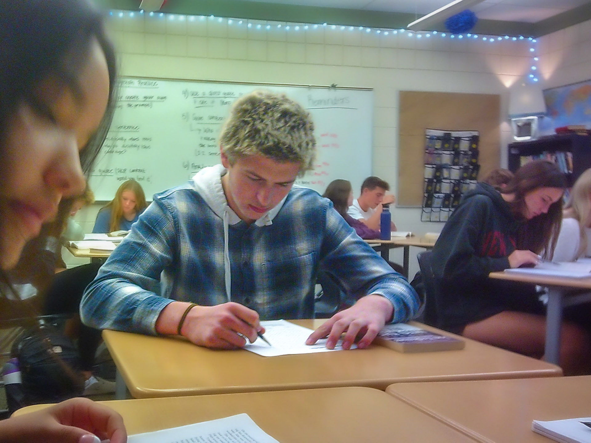 Cayden Nostrant dives into Into the Wild in Journalism. (Photo by Ava LaBine)