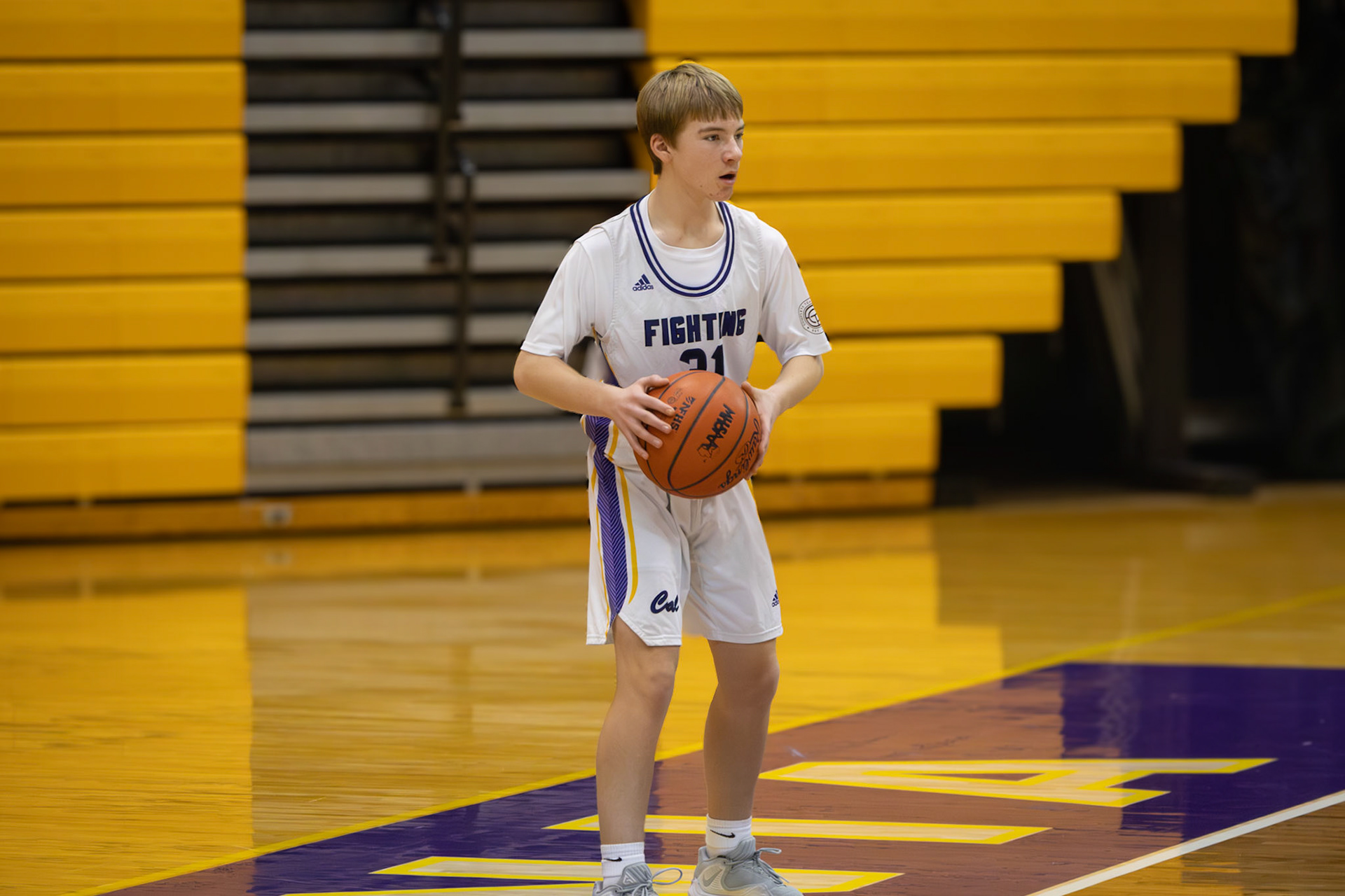 Bryson Raffler checks for a teamate to pass to on a throw in. (Photo by Thomas McKee)