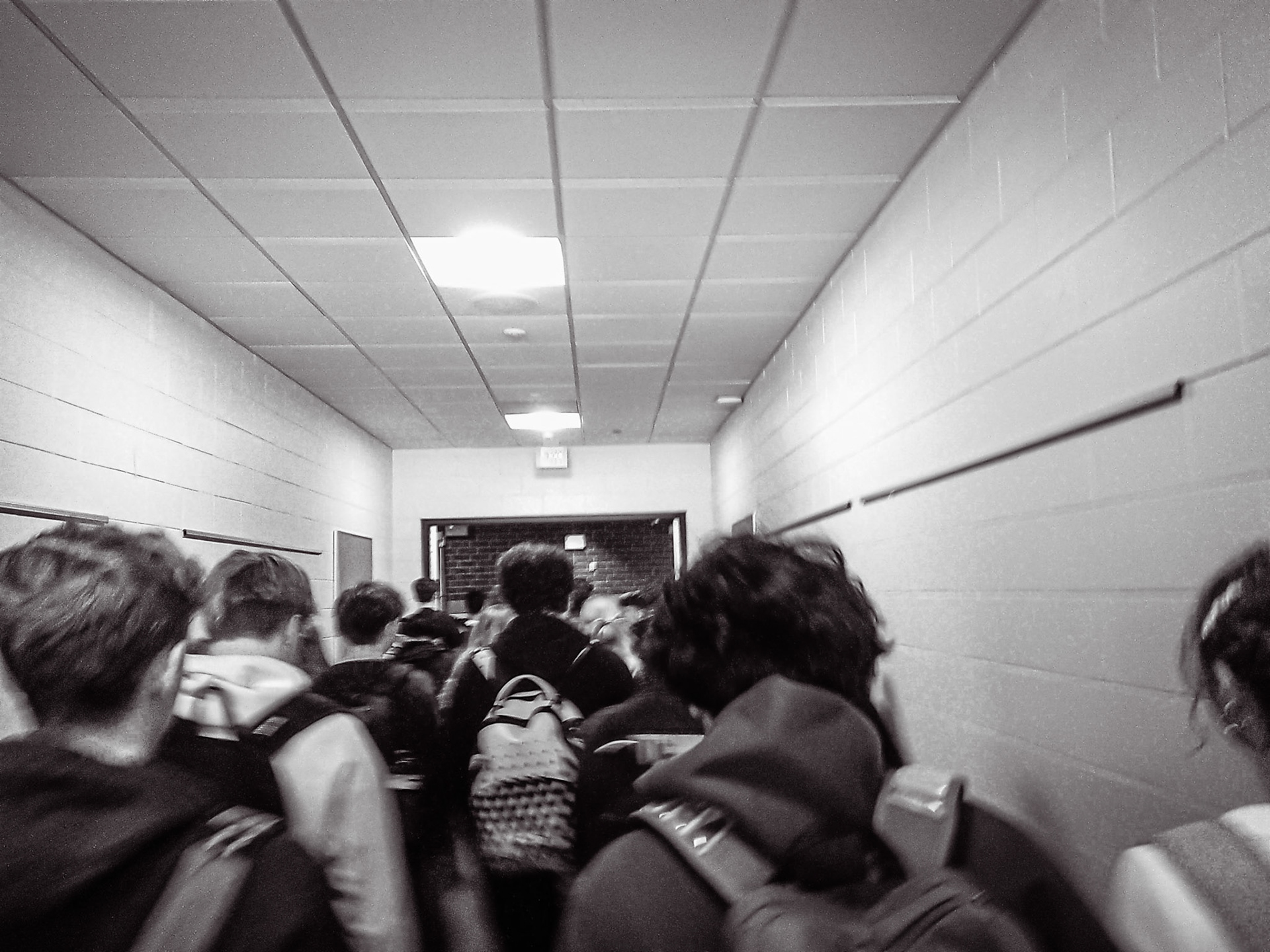 Frantically rushing to lunch, these students try to snatch a table before they all get taken. (Photo by Emma Garza)