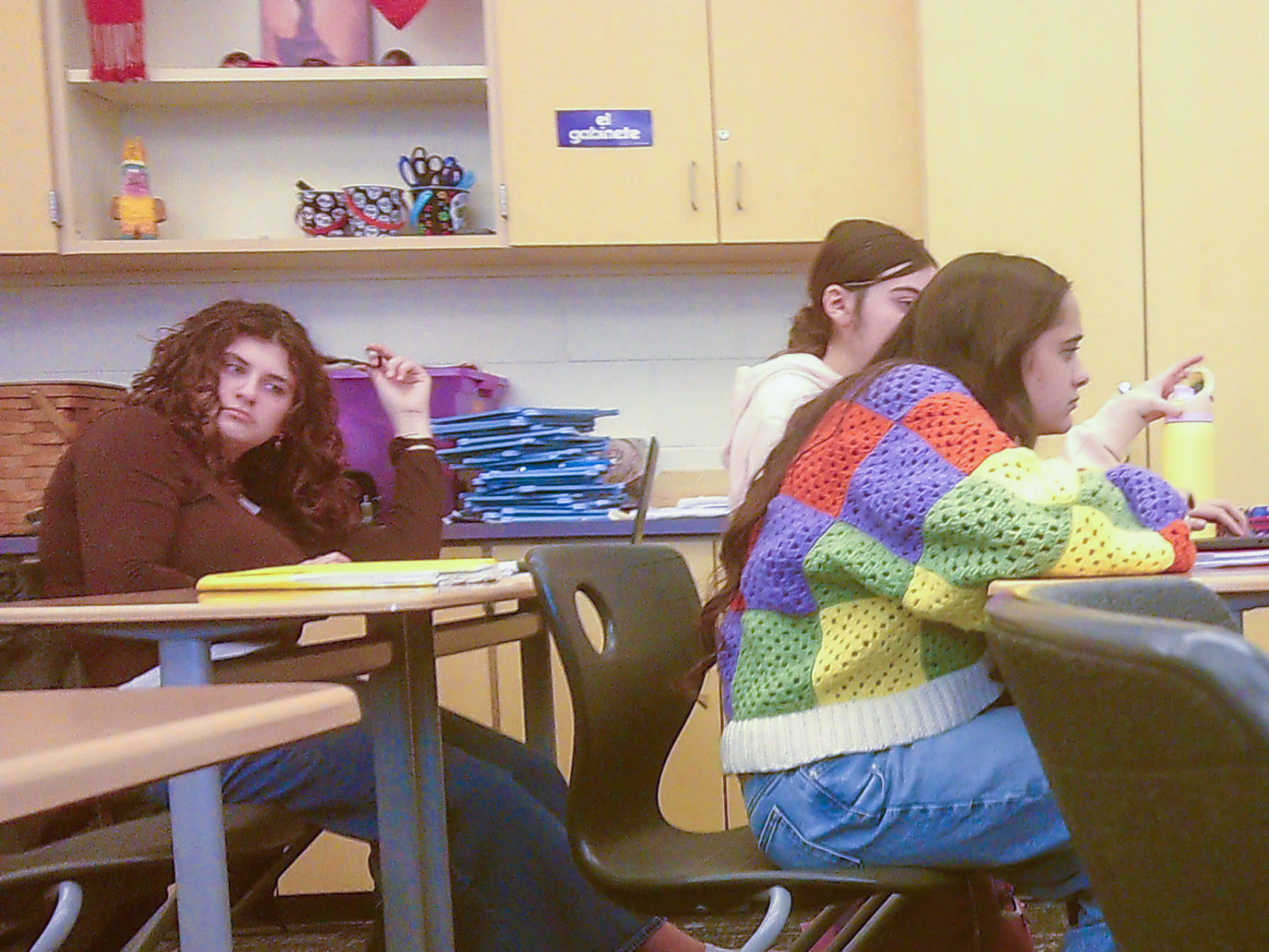 REAL WORLD Senior Maya White works on a script for her real-world scenario activity in Spanish 4. (Photo by Avarey Lippert)