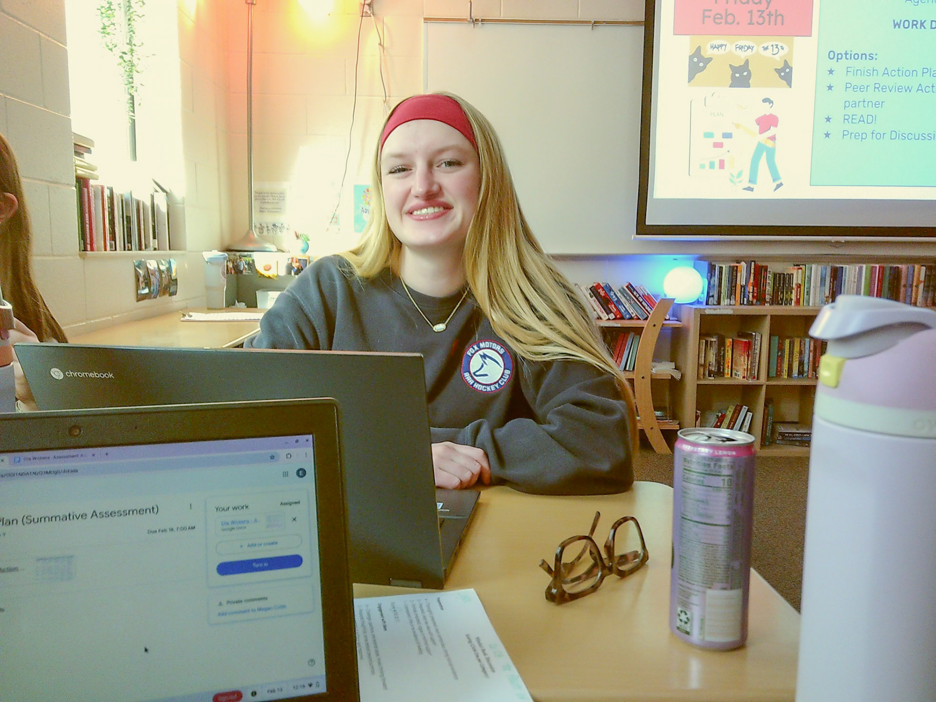 Pausing from her work, Lyla Keller takes a look up at the camera. (Photo by Ella-Grace Wickens)