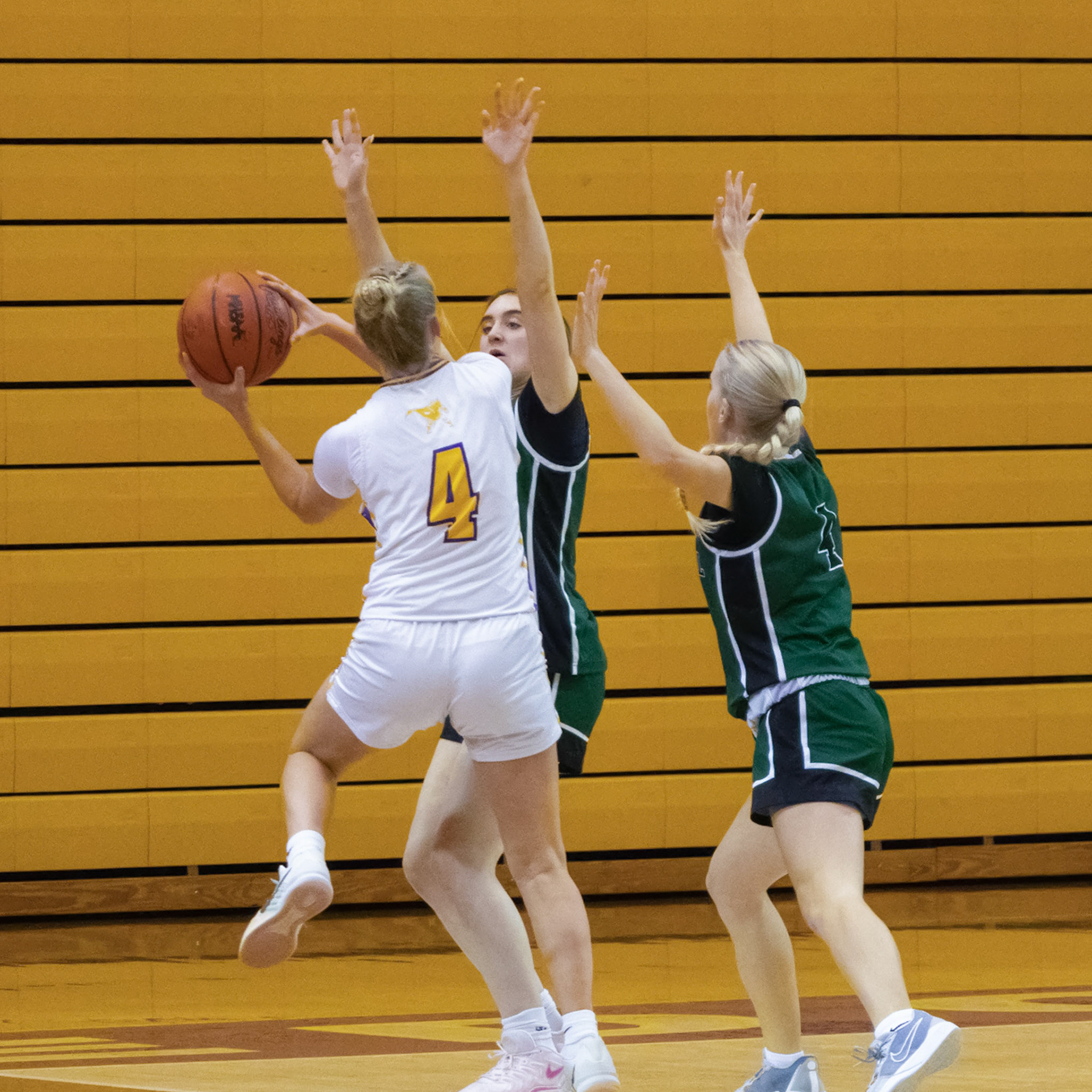 Myla Gortmaker attempts to score against Forest Hills Central. (Photo by Tana Coates)