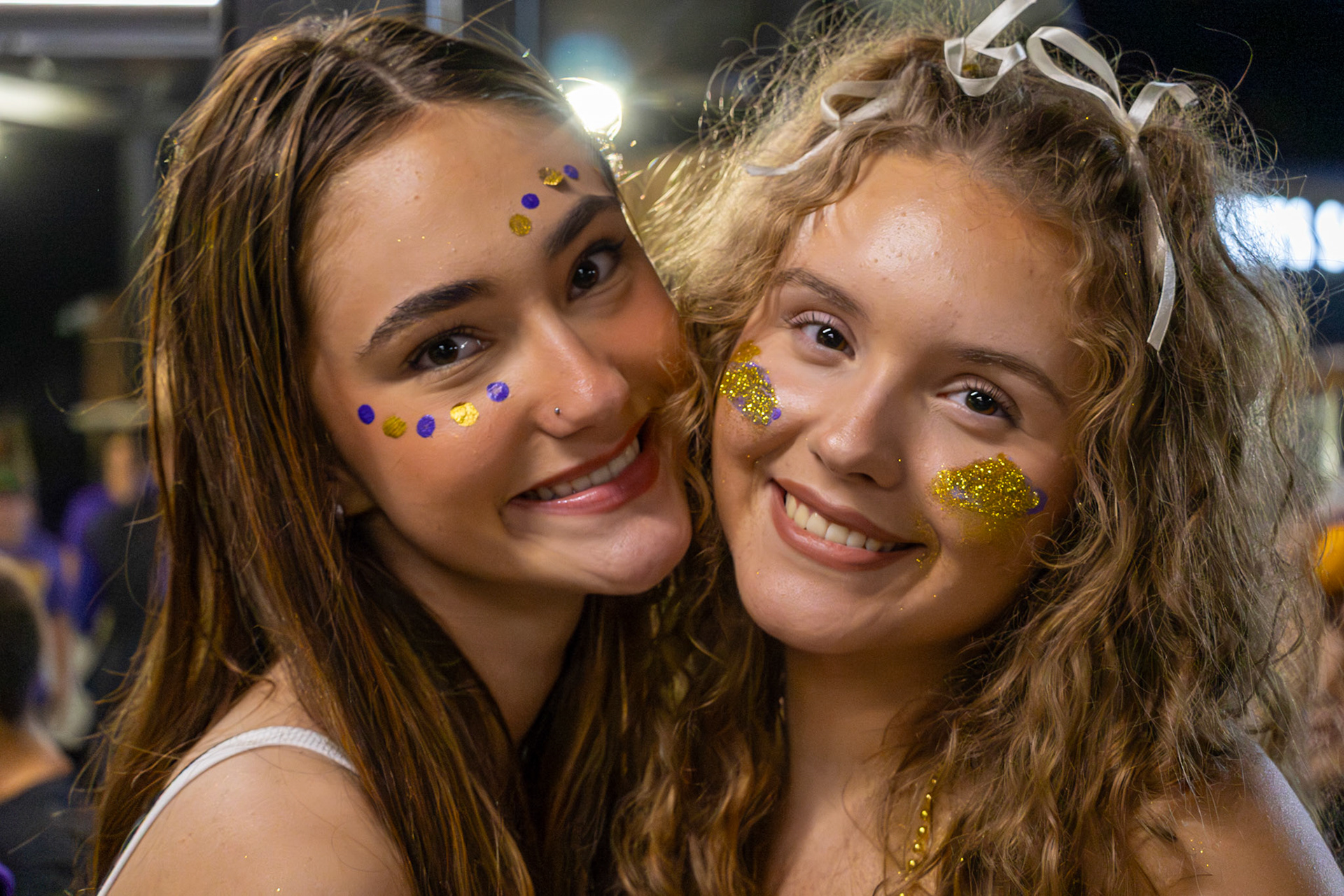 PIT STOP Seniors Leila Terzic and Keira Marshall grab a quick snack at the concession stand, keeping the Homecoming energy alive. (Photo by Brianna Severson)