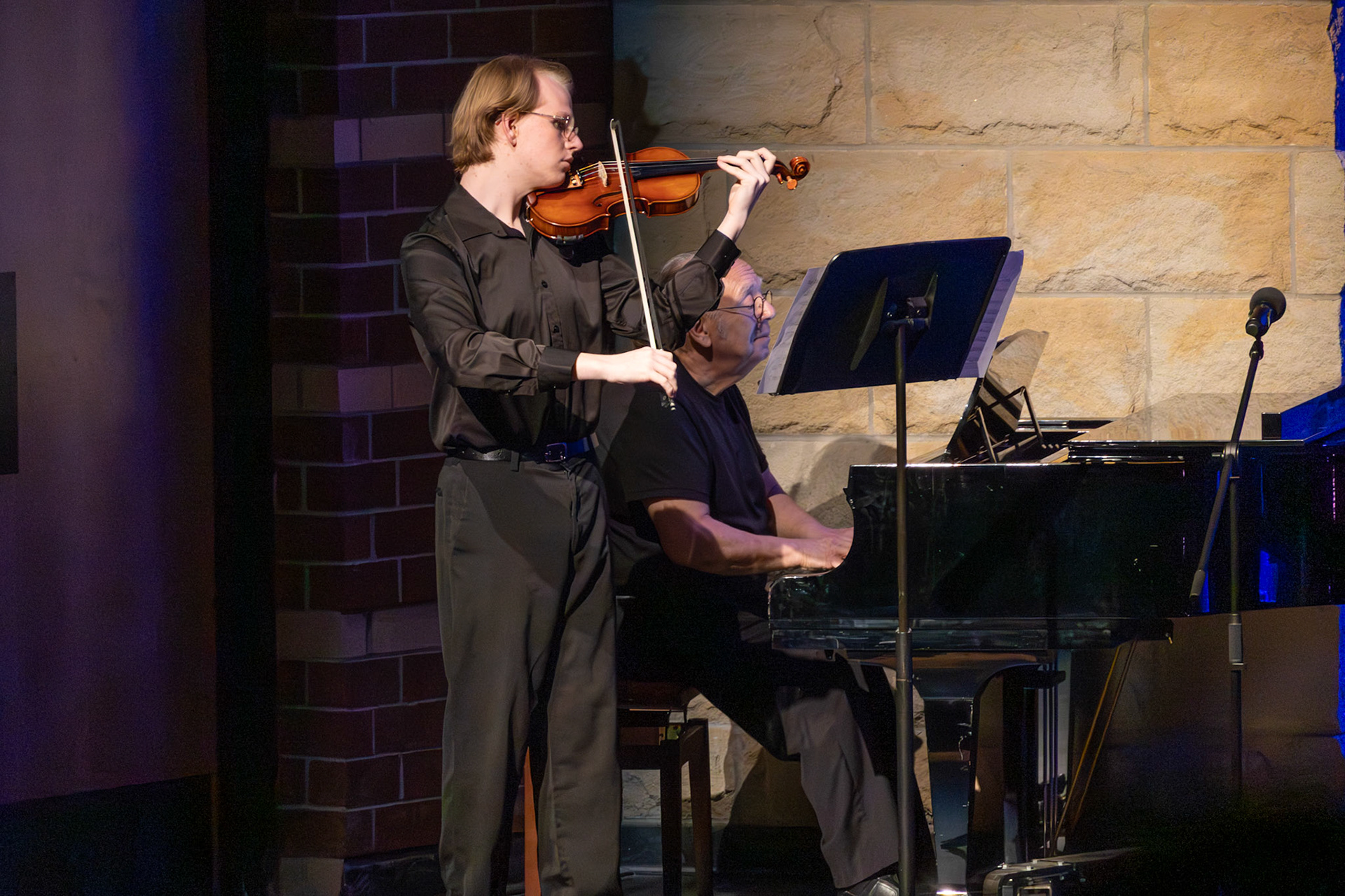 Caleb Parlin aces his final violin solo song as a senior, with pianoist Mr. Ramsey by his side. (Photo by Sophia Myers)