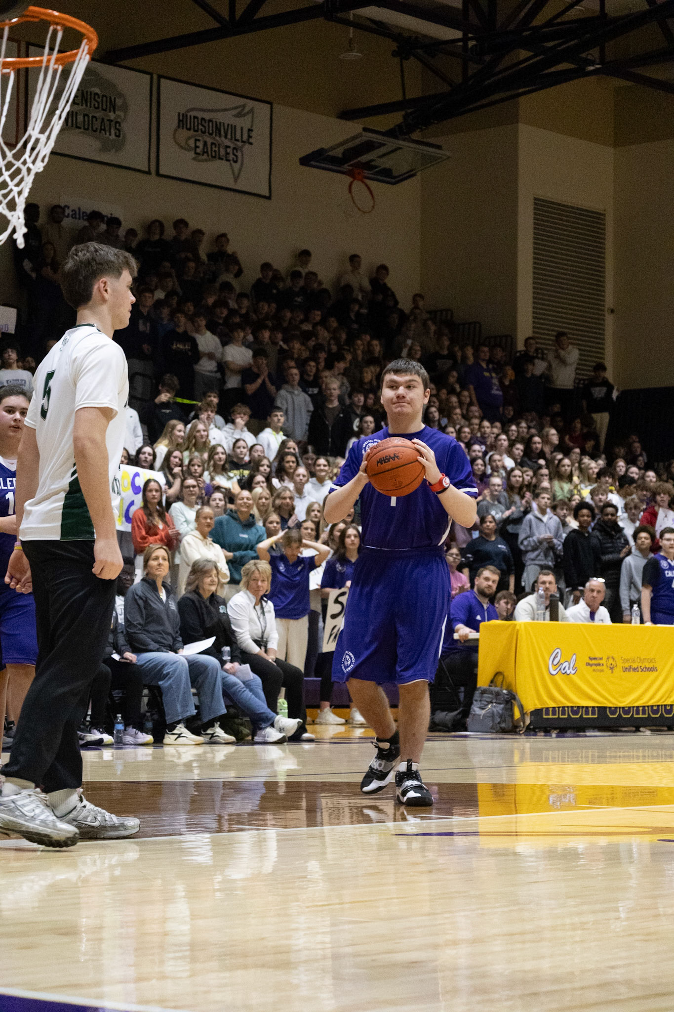 Ethan Boucher nears the basket, ball in hand and ready to take the shot. (Photo by Avarey Lippert)