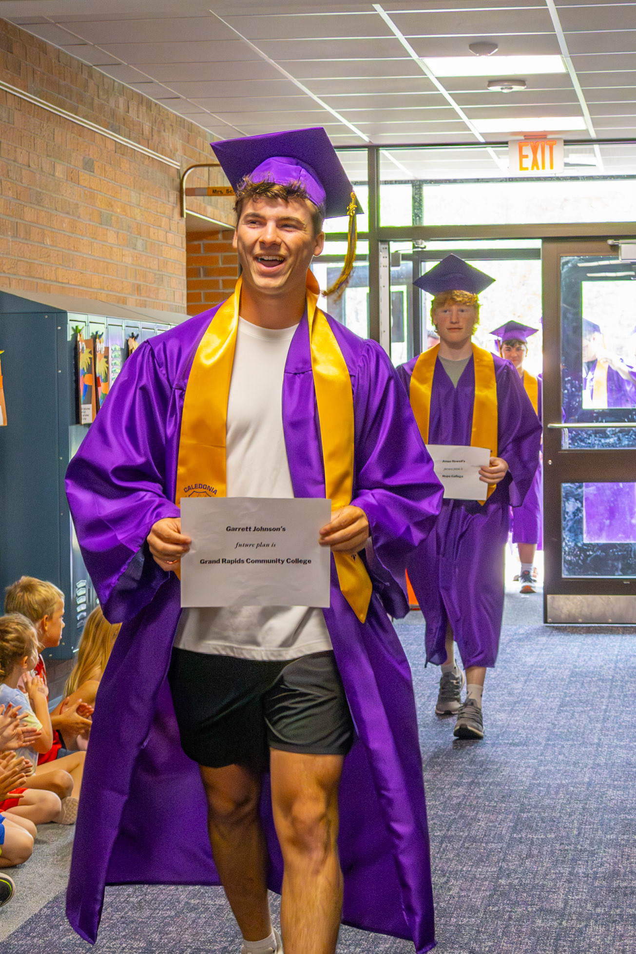 Caledonia Elementary greets graduating senior Garrett Johnson with a warm welcome. (Photo by Sophie Grajewski)