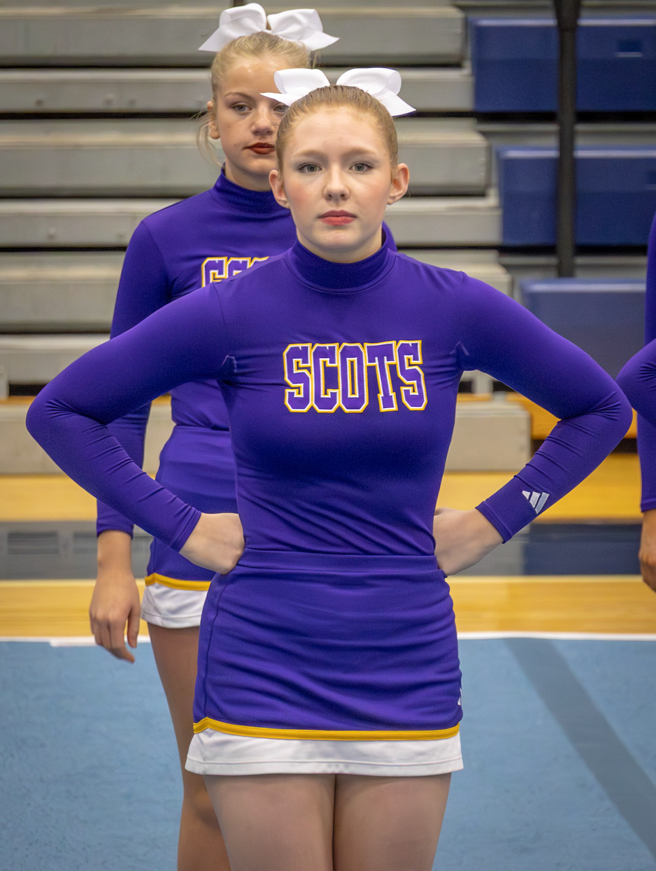 In the first round of Cheer Districts, Abi Putnam brought skill, spirit, and determination to the mat. (Photo by Lilli Jackson)