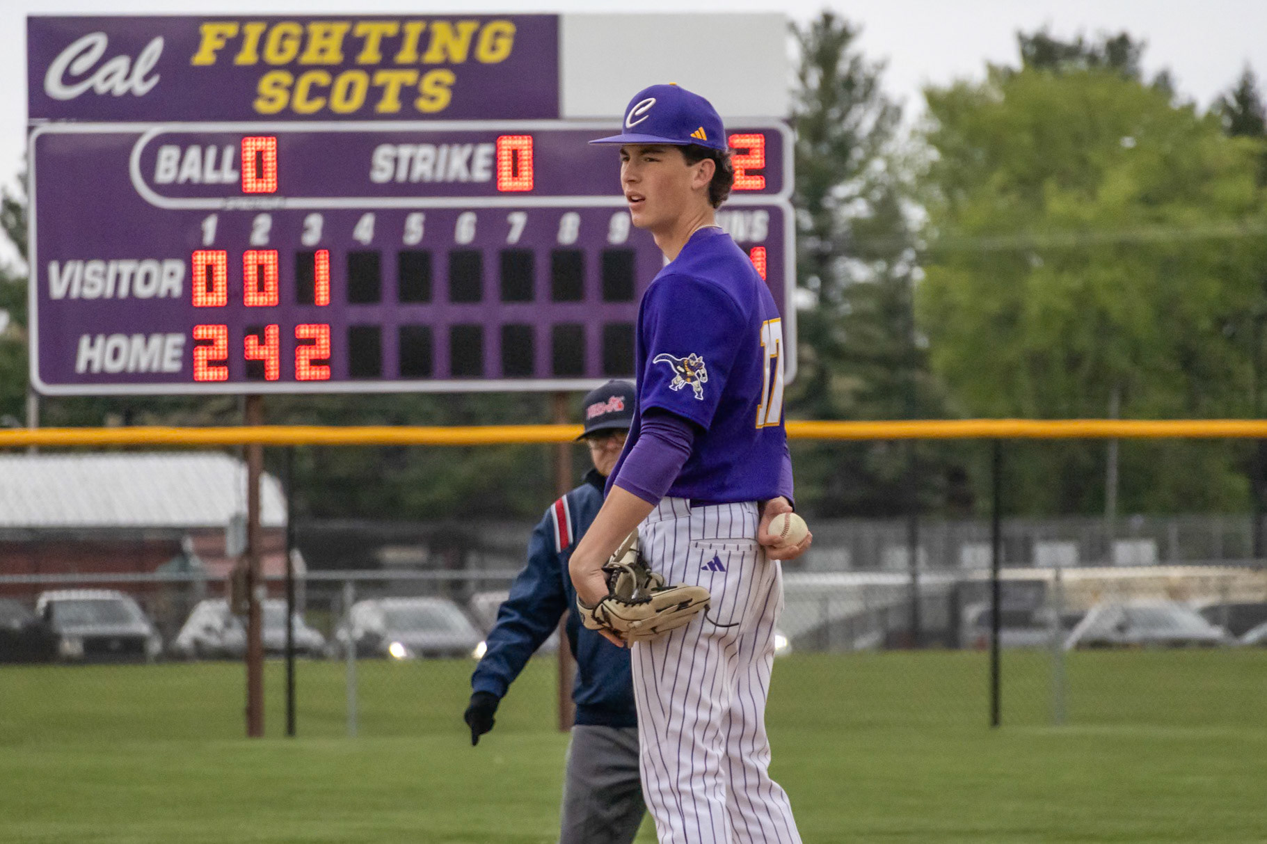 Reading the pitch signaled by the catcher, Gabe Trudeau considers his options for the next pitch. (Photo by Ella-Grace Wickens)