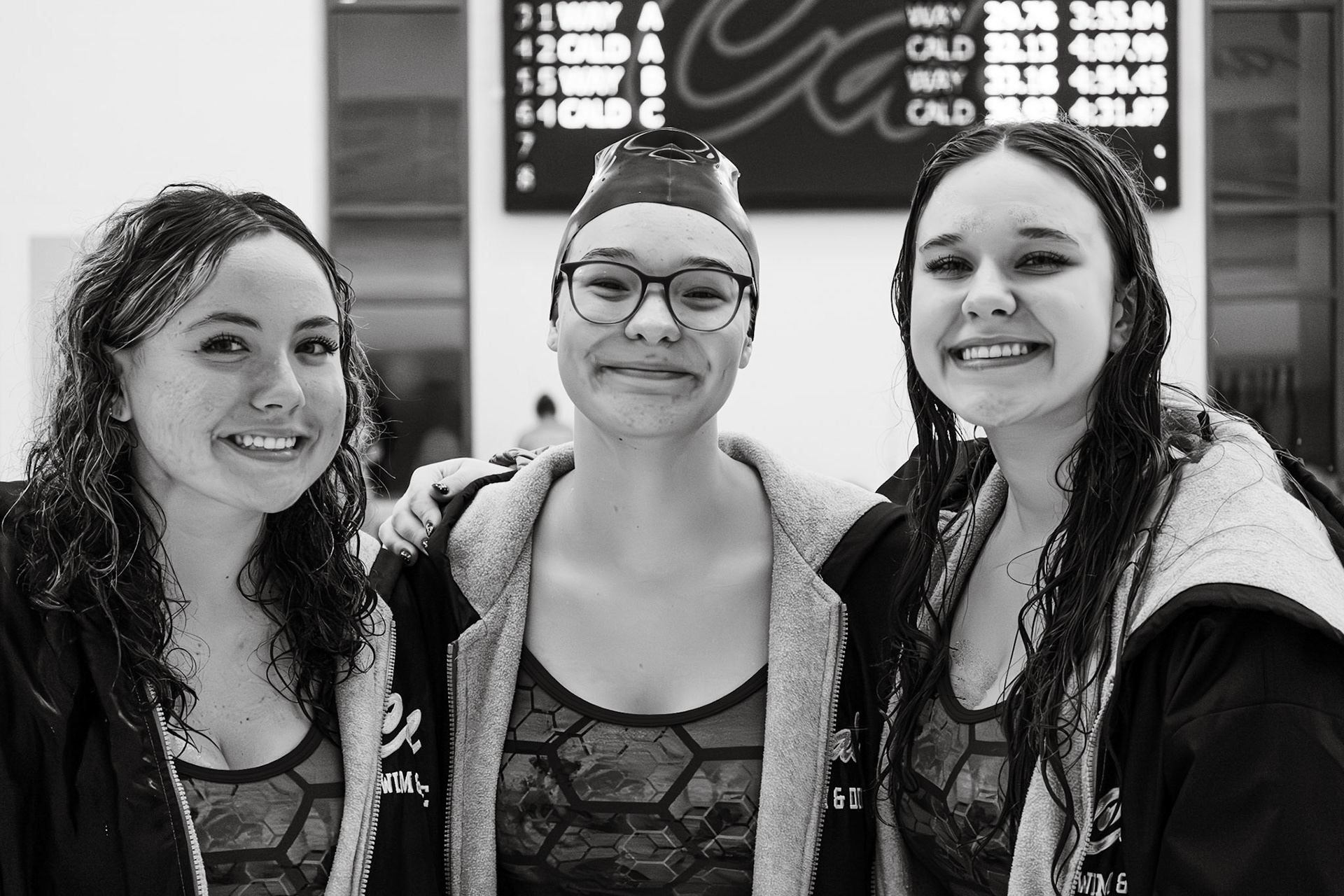 livia Baareman, Reagan Cobbs, and Sasha Aycock celebrate their victory over Wayland. (Photo by Abby Skibinski)