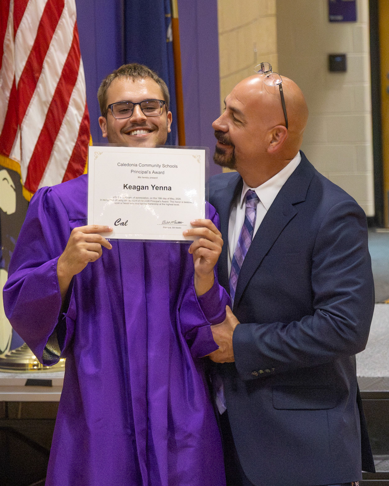 Keagan Yanna accepts the Principal's Award from Mr. Martin. (Photo by Emma Garza)