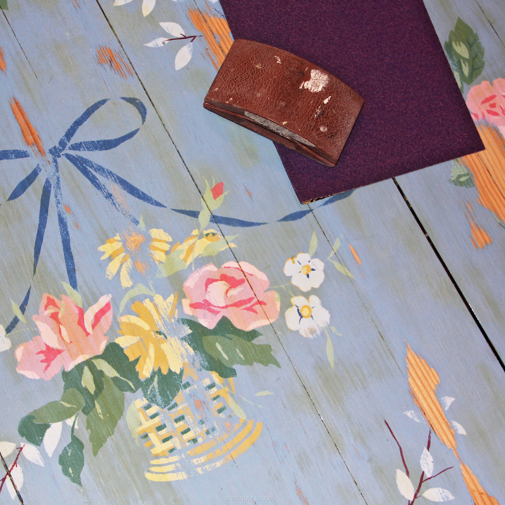 Sanding The Damaged Floral Paint