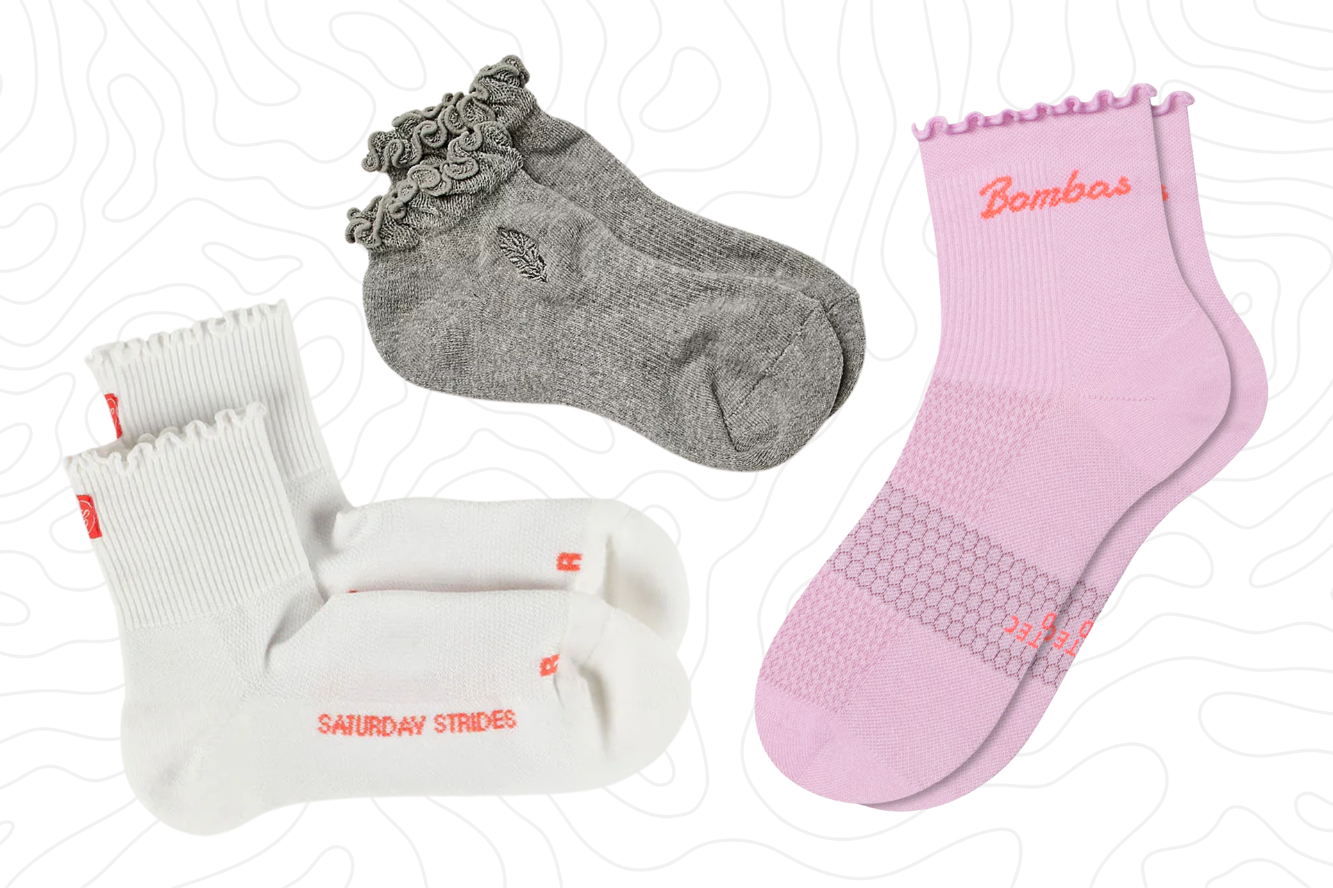 White quarter ruffle socks, grey ankle ruffle socks, and pink quarter ruffle socks