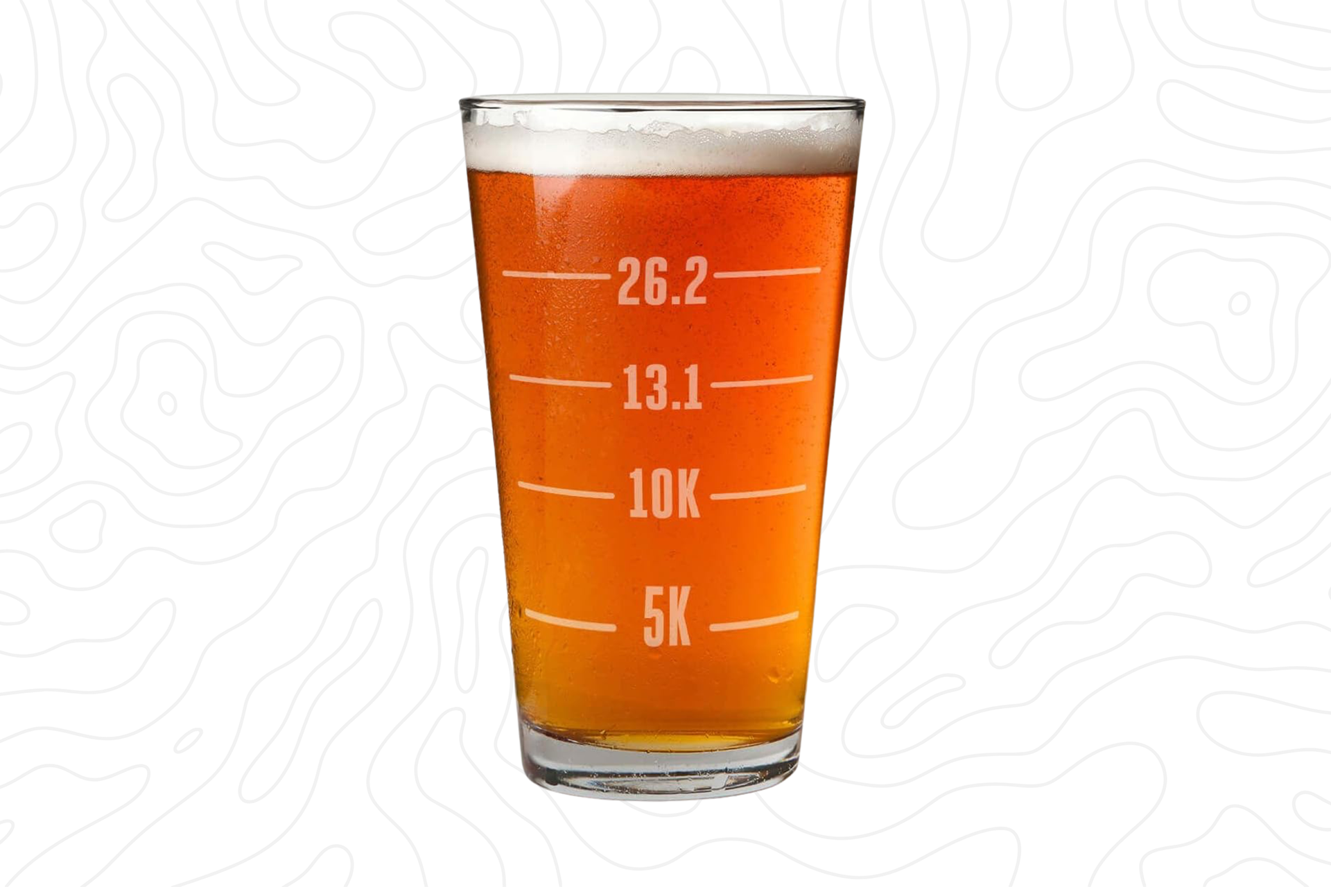Full beer pint glass with 5k, 10k, 13.1 mi, 26.2 mi running distances engraved on