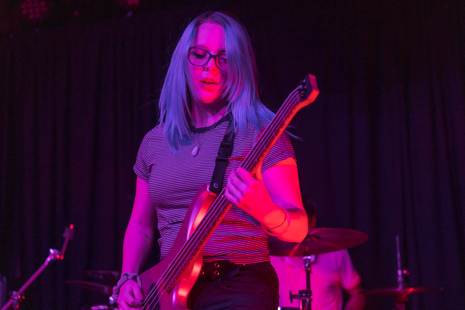 Kelsey Gant, bass guitarist for for Denver, Colorado pop-punk band Suitable Miss, performs at The Coast during the band's Fall Tour 2022, Oct. 23.